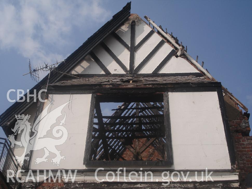Colour photograph showing window 11 and barge board 05 in the south facing elevation of The Grange Hotel produced by JP Architects, 2011.