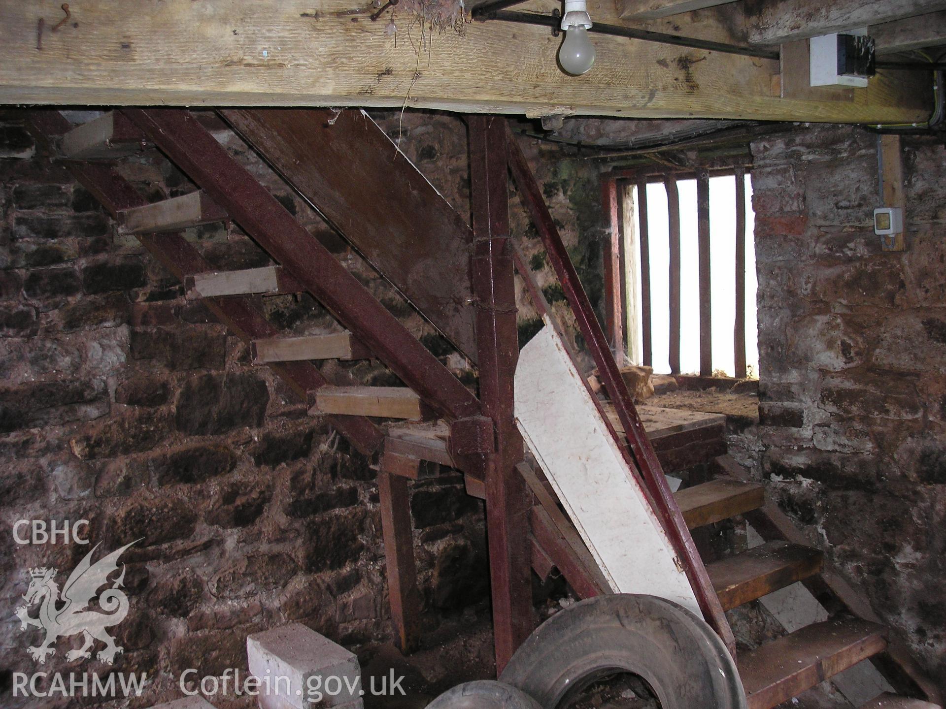 Interior of barn showing stairs