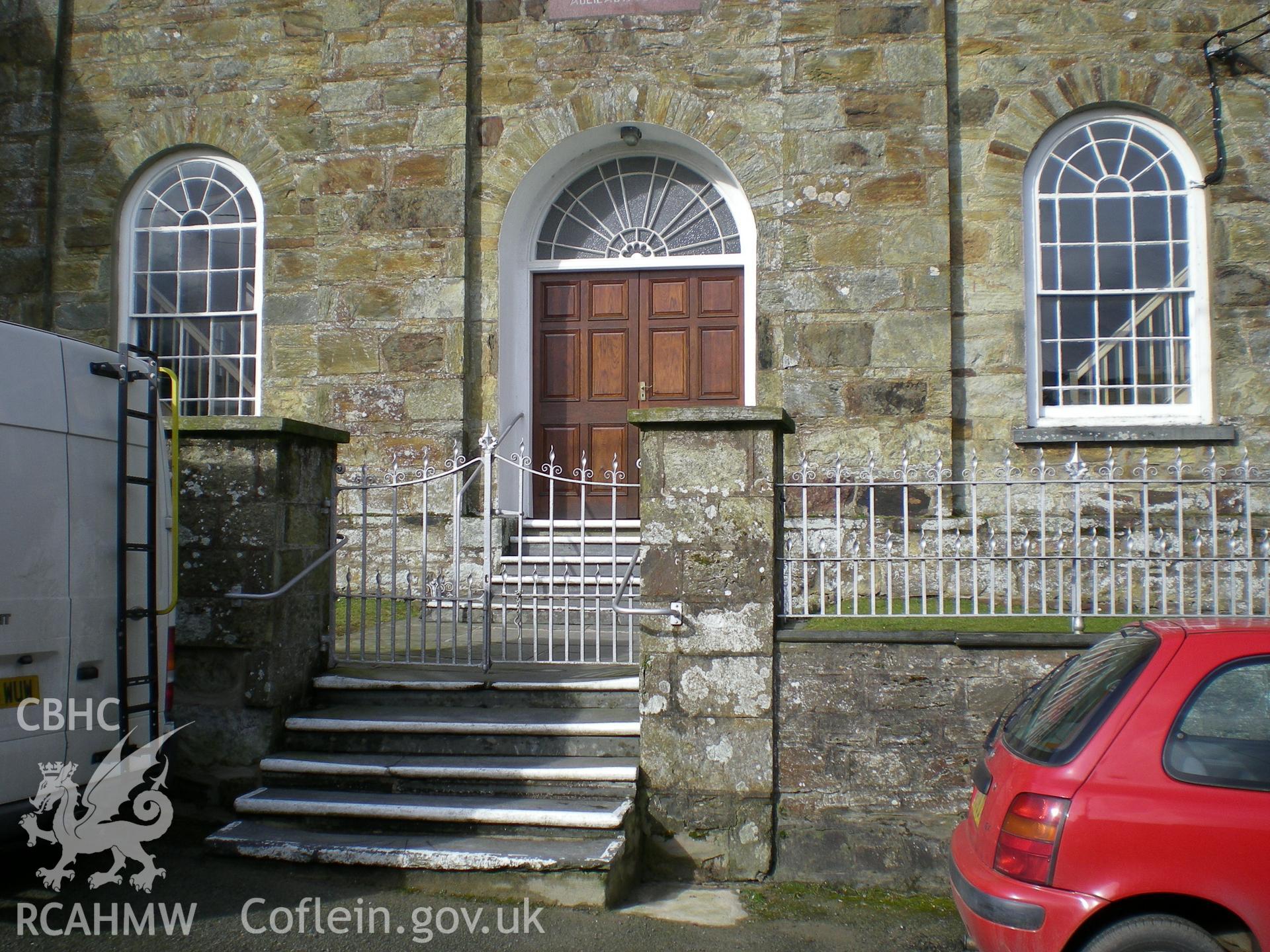 Colour photograph showing doorway and entrance in the main elevation.