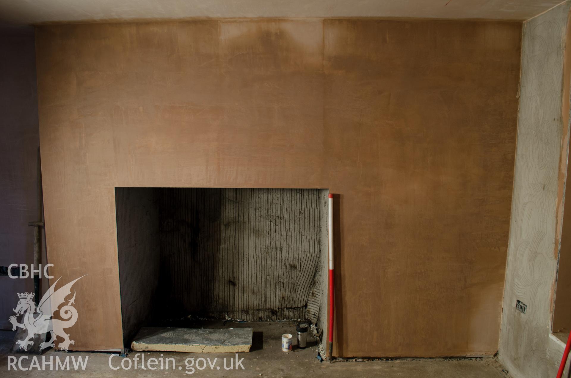View from the south. "North elevation with fire place in what will be the dining room".