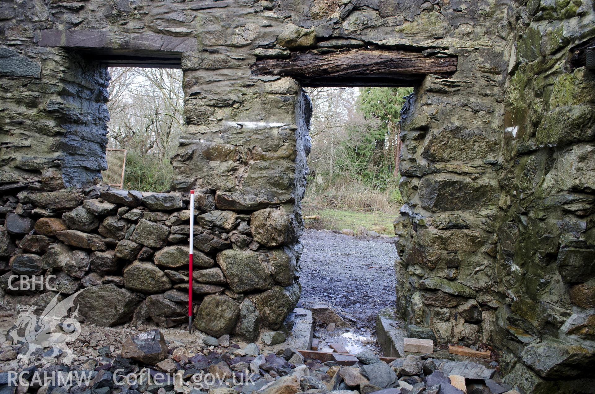 View from south-east showing NW wall of the SW room, taken by Jessica Davidson, Gwynedd Archaeological Trust, 8th Jan 2016.