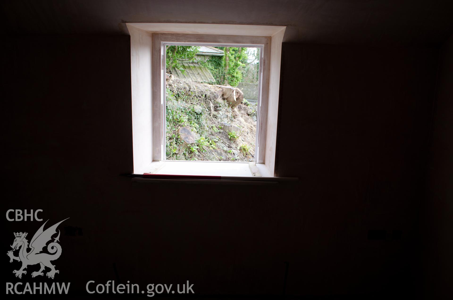 View from the west showing window of proposed front bedroom, at northern half of cottage, on first floor.