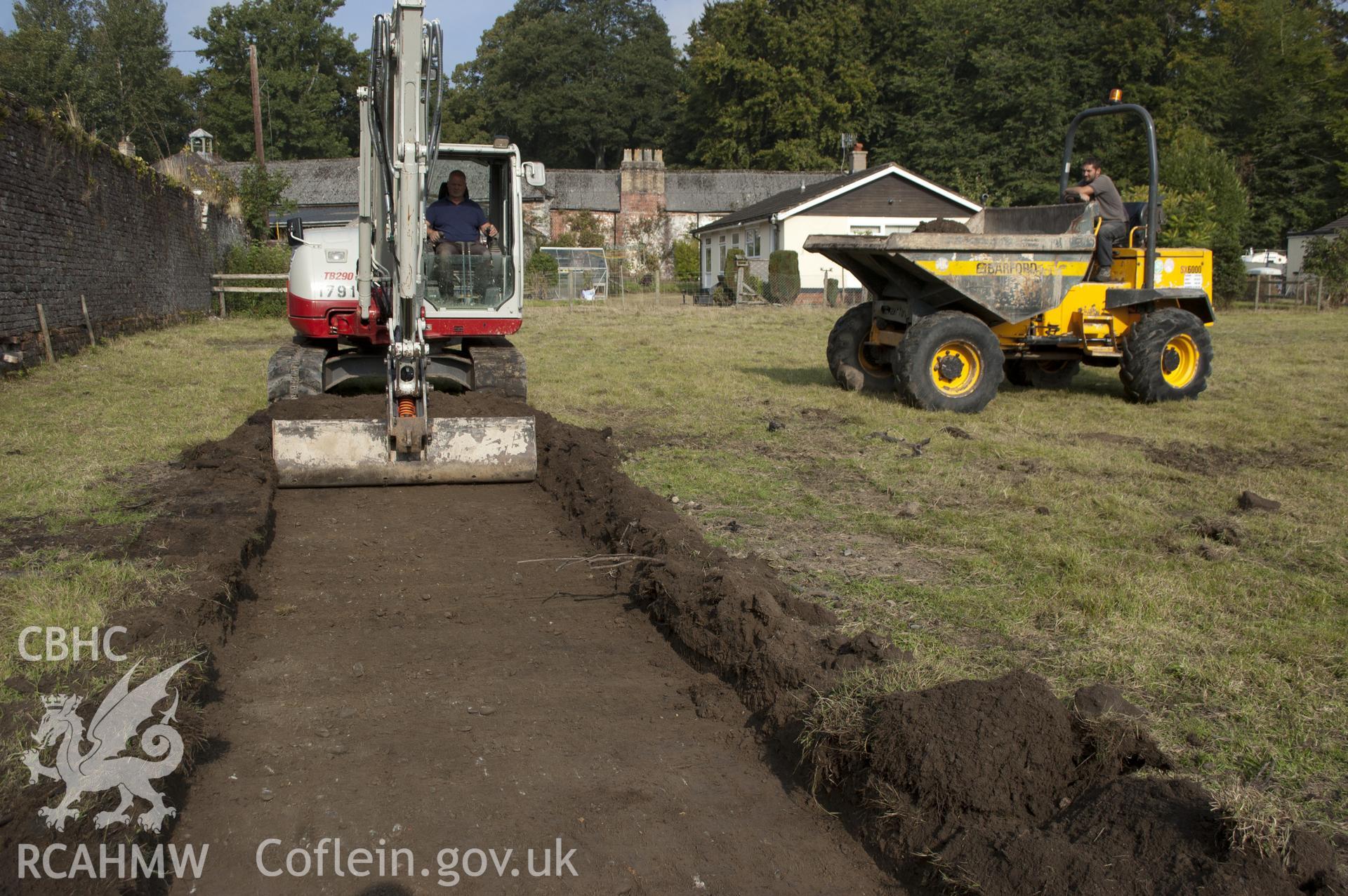 View from south-east showing topsoil strip of tennis court.