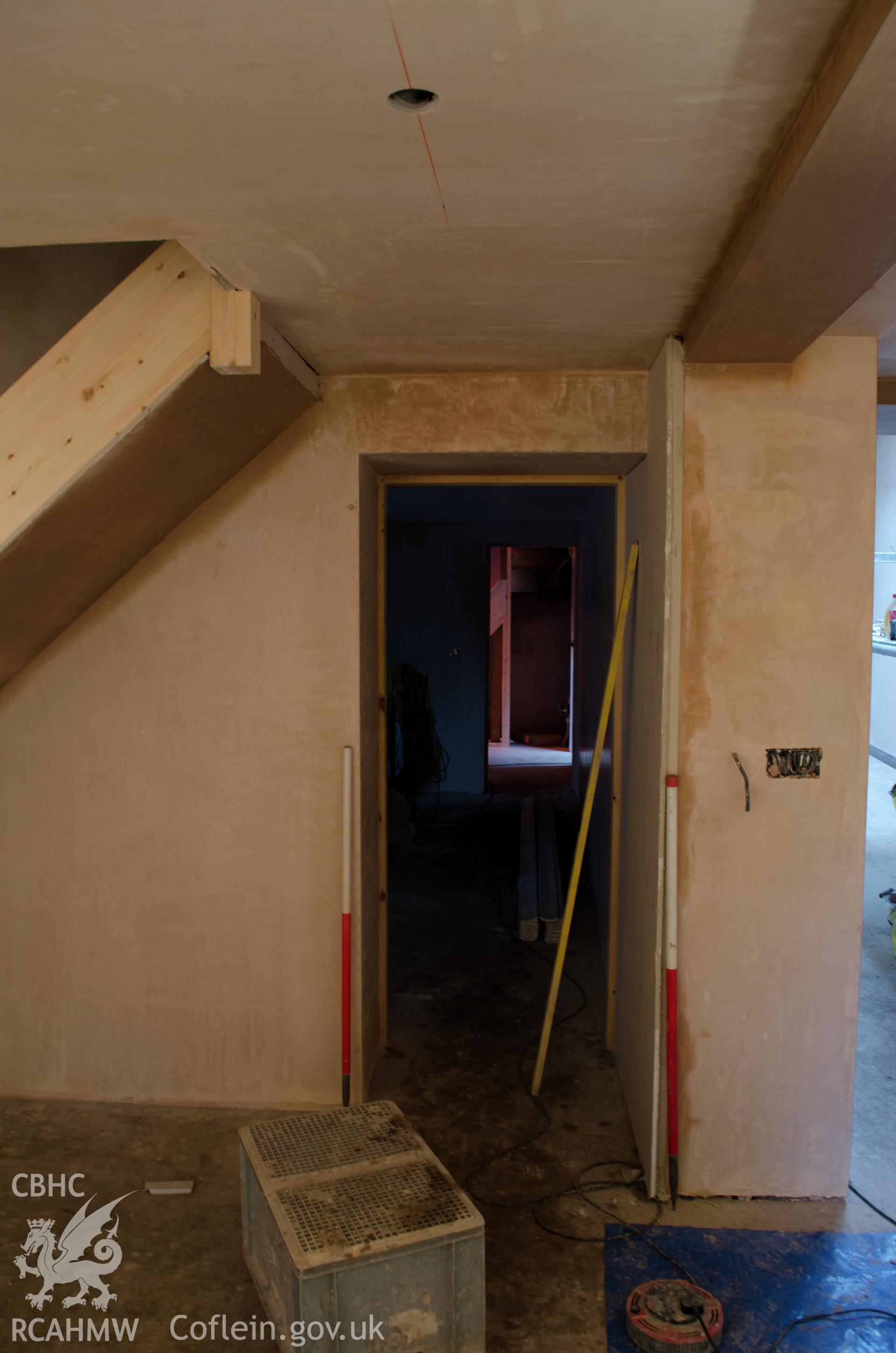 View from the east. Door way between the proposed lounges, taken from front lounge.