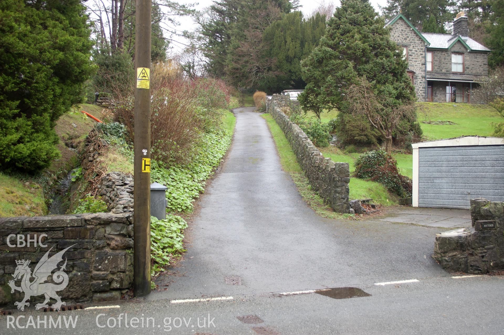 Marian Mawr archaeological assessment; section H-I,  from S, view from the road up lane between houses along which pipeline route will run,  taken by Robert Evans of Gwynedd Archaeological Trust, 5th February 2016.
