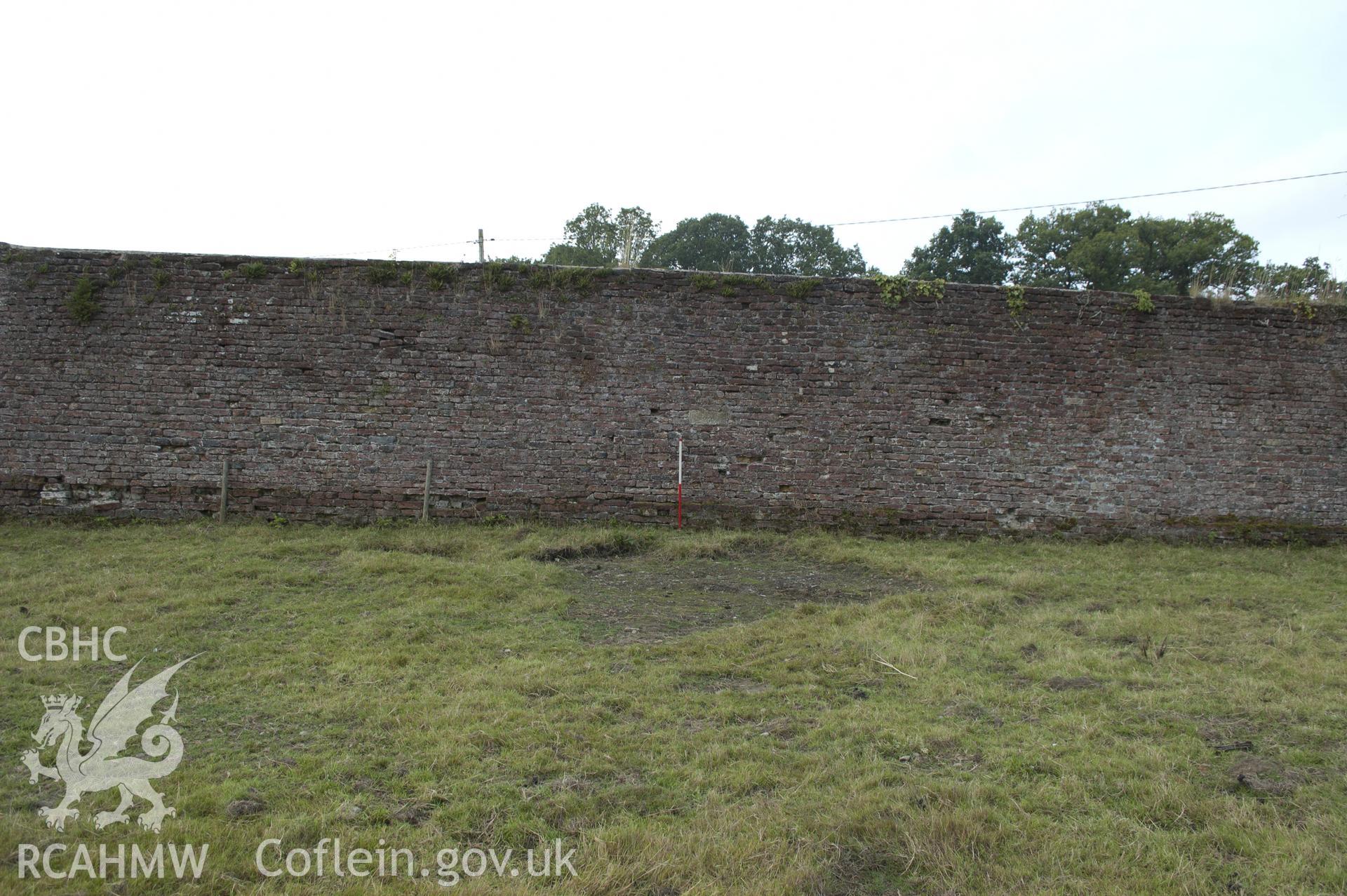 View from north-east showing southern wall of kitchen garden.
