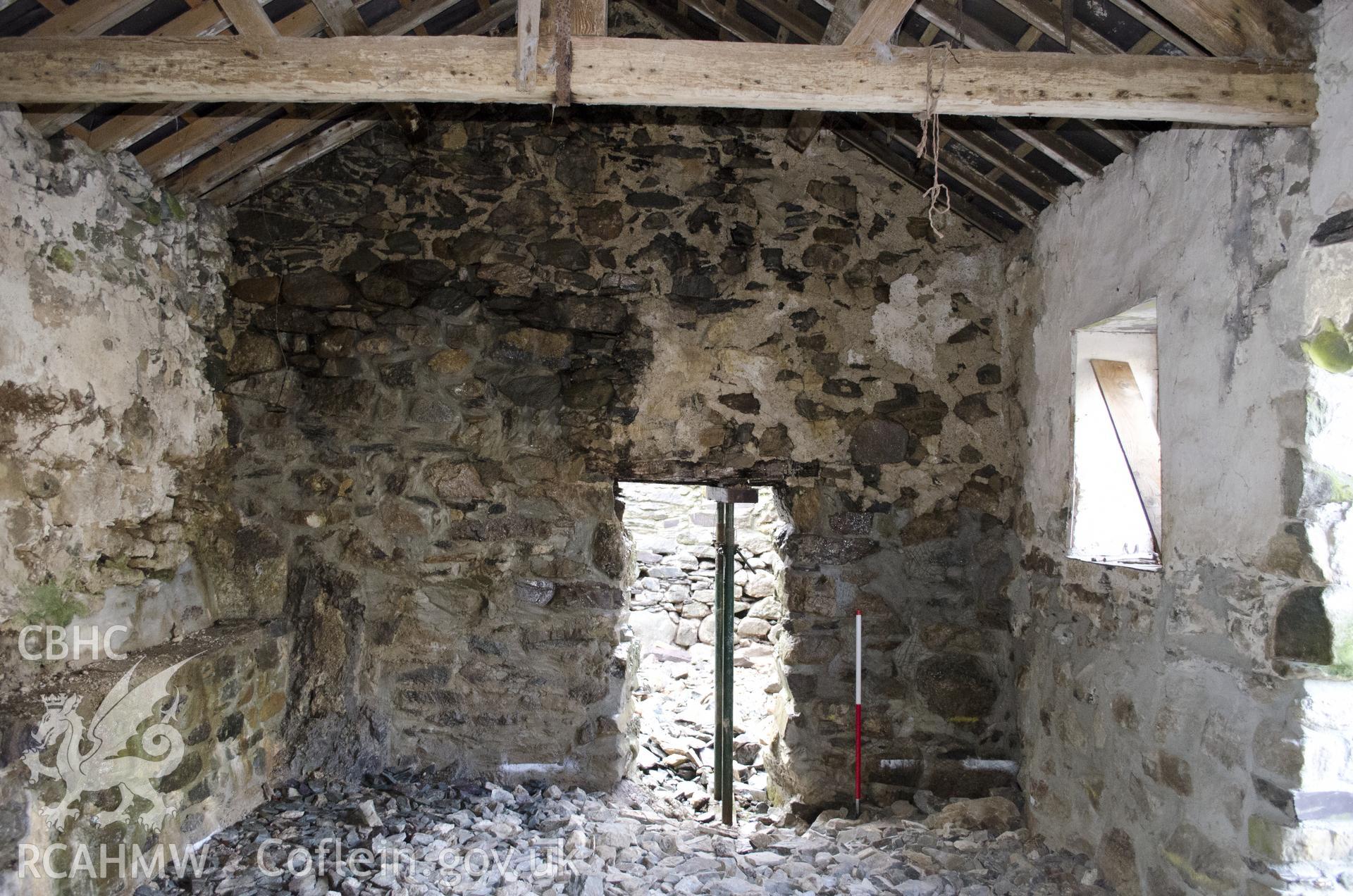 View from north-east showing SW wall of the NE room, taken by Jessica Davidson, Gwynedd Archaeological Trust, 8th Jan 2016.
