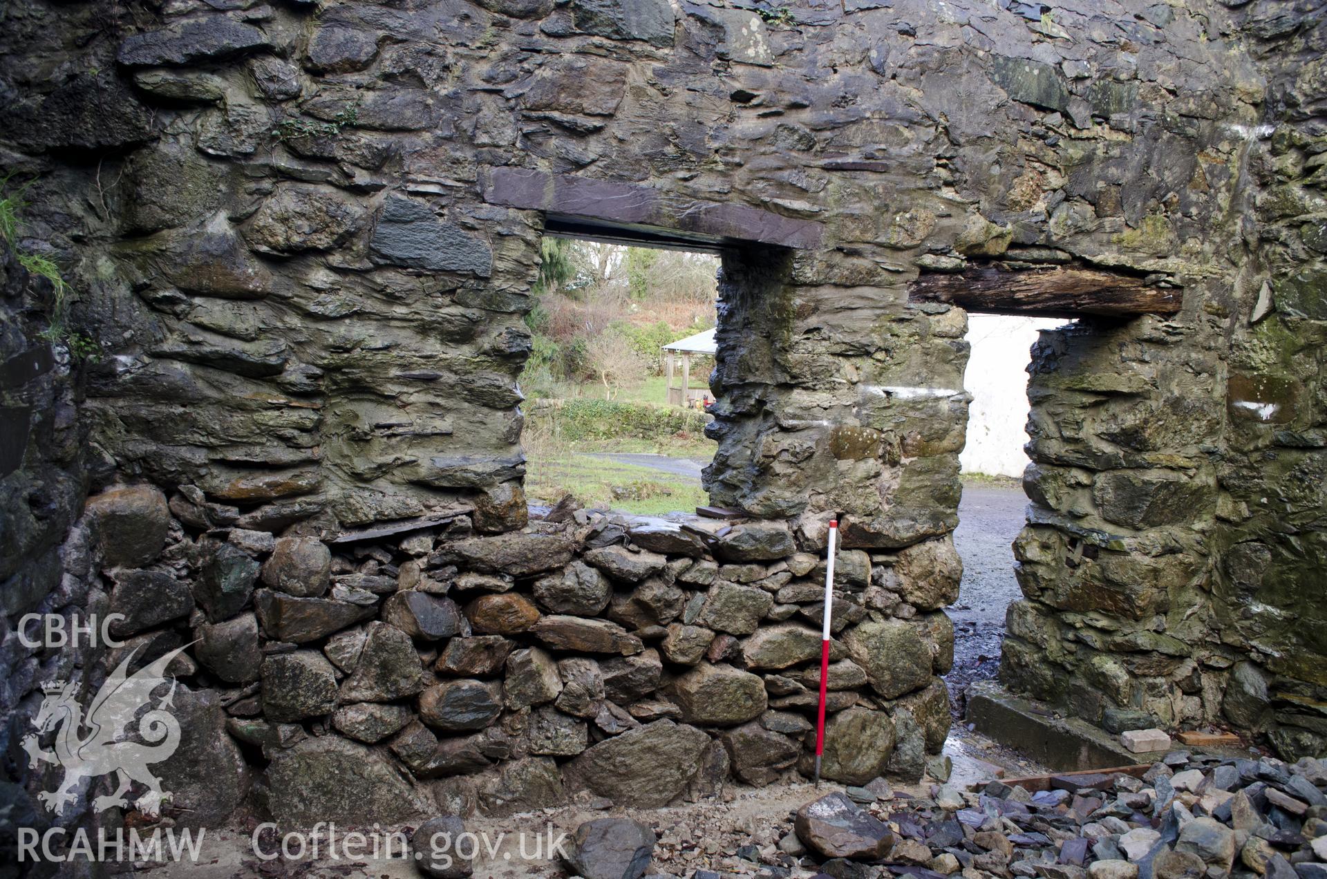 View from south showing NW wall of the SW room, taken by Jessica Davidson, Gwynedd Archaeological Trust, 8th Jan 2016.