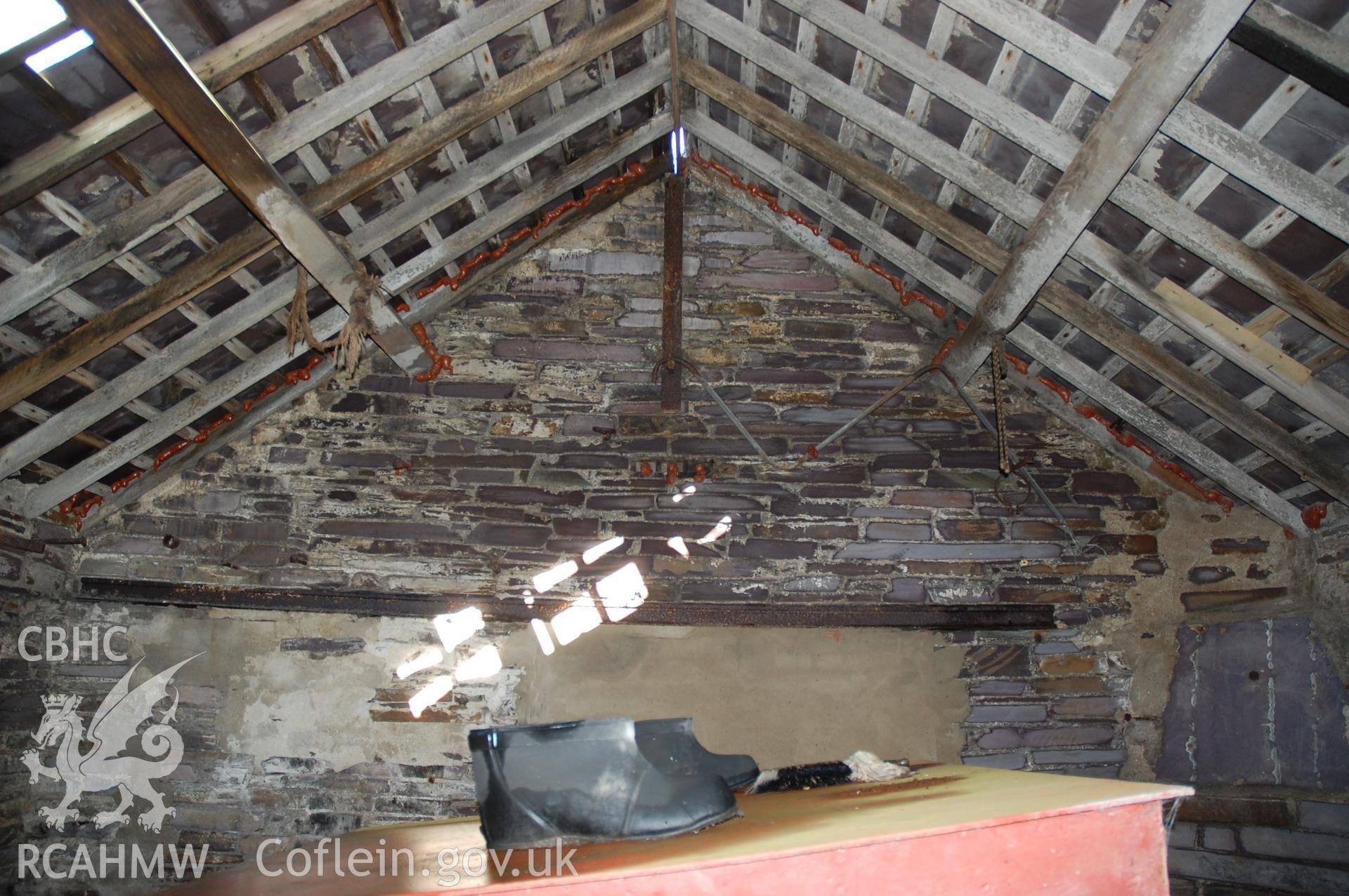 Colour digital photograph of a South East external elevation, showing a blocked window in a building at Pen Yr Orsedd Quarry.