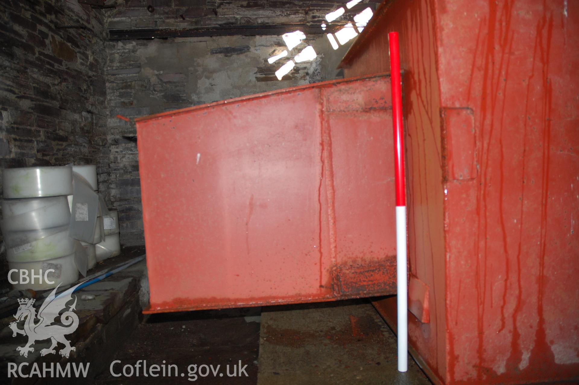 Colour digital photograph showing a North East facing view of an explosives box in a building at Pen Yr Orsedd Quarry.