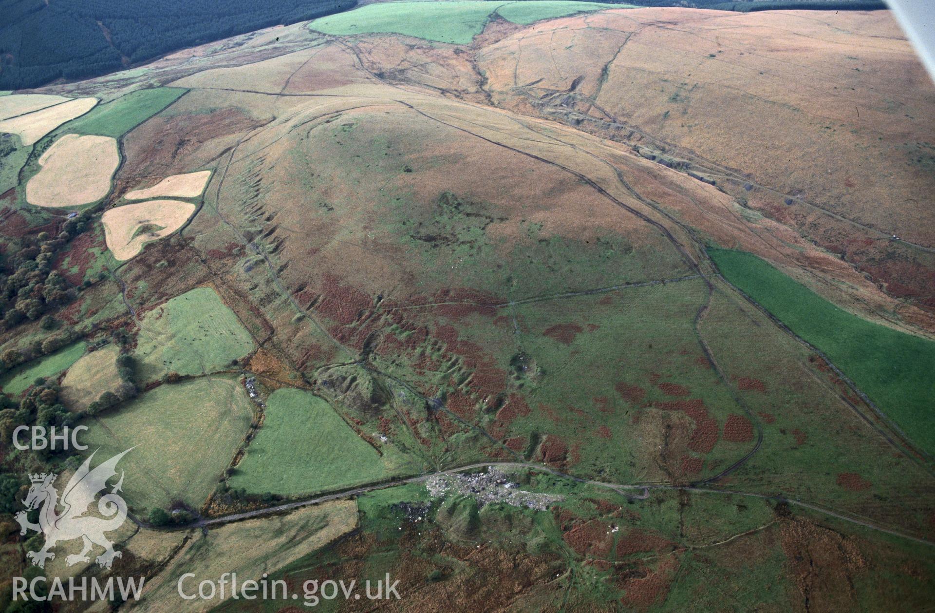 Slide of RCAHMW colour oblique aerial photograph of Foel Y Dyffryn Mine Workings, taken by C.R. Musson, 21/10/1992.