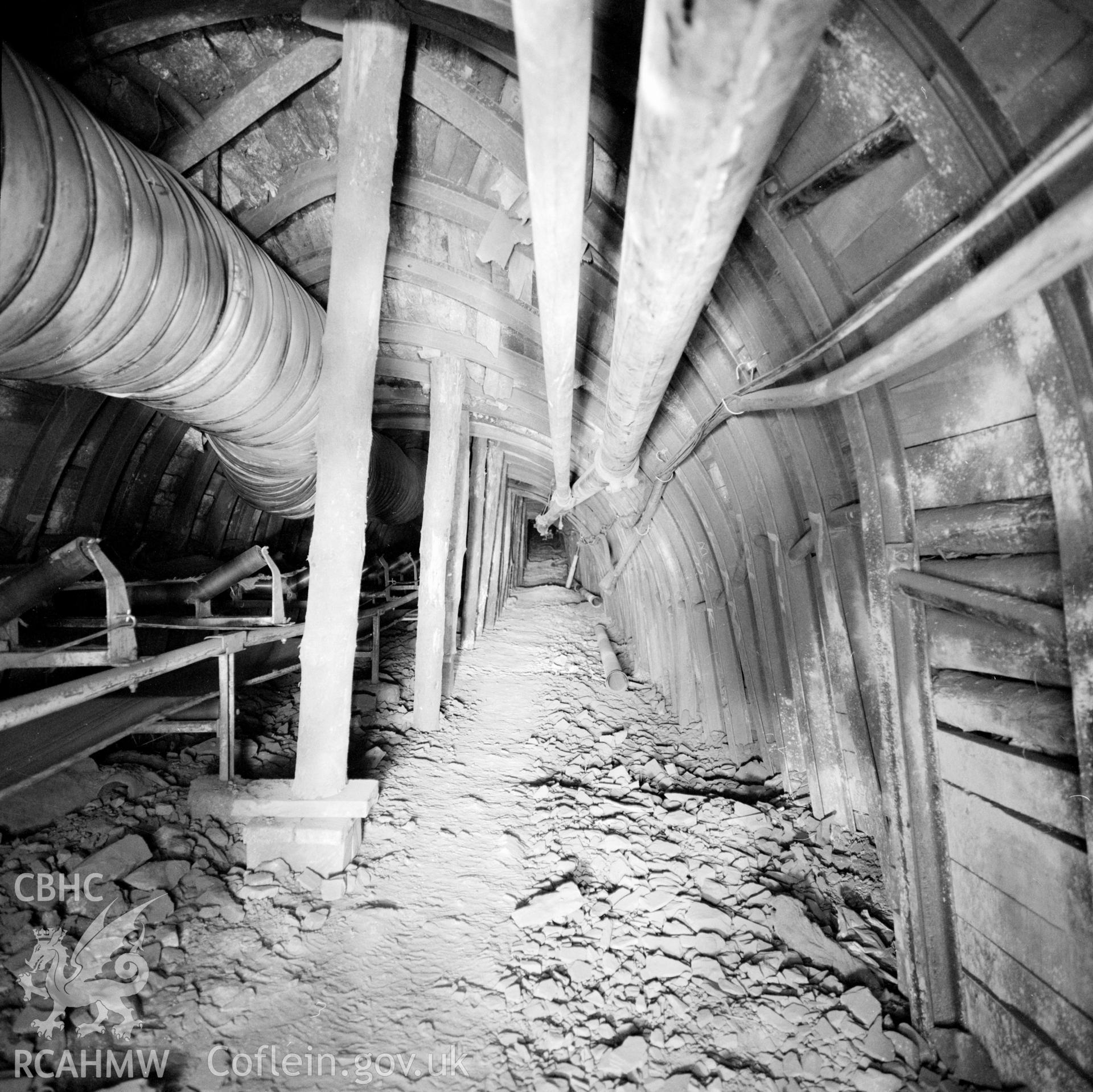 Timbering on a fault in a main trunk road with conveyor (Cornwell ref: MV15). NA/GEN/90/047e