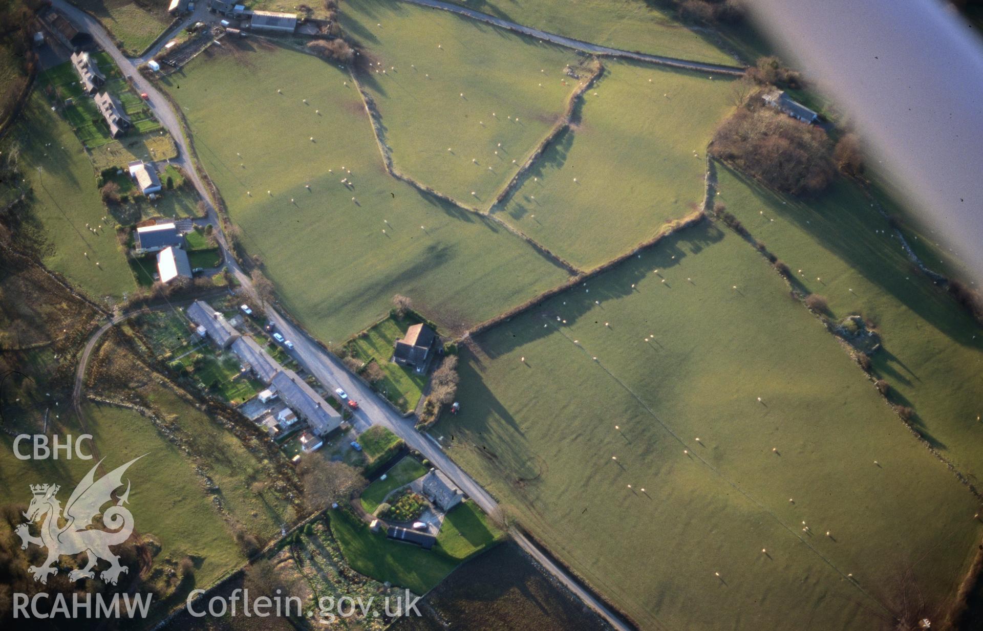Slide of RCAHMW colour oblique aerial photograph of Brithdir Roman Fort, taken by T.G. Driver, 17/3/1999.
