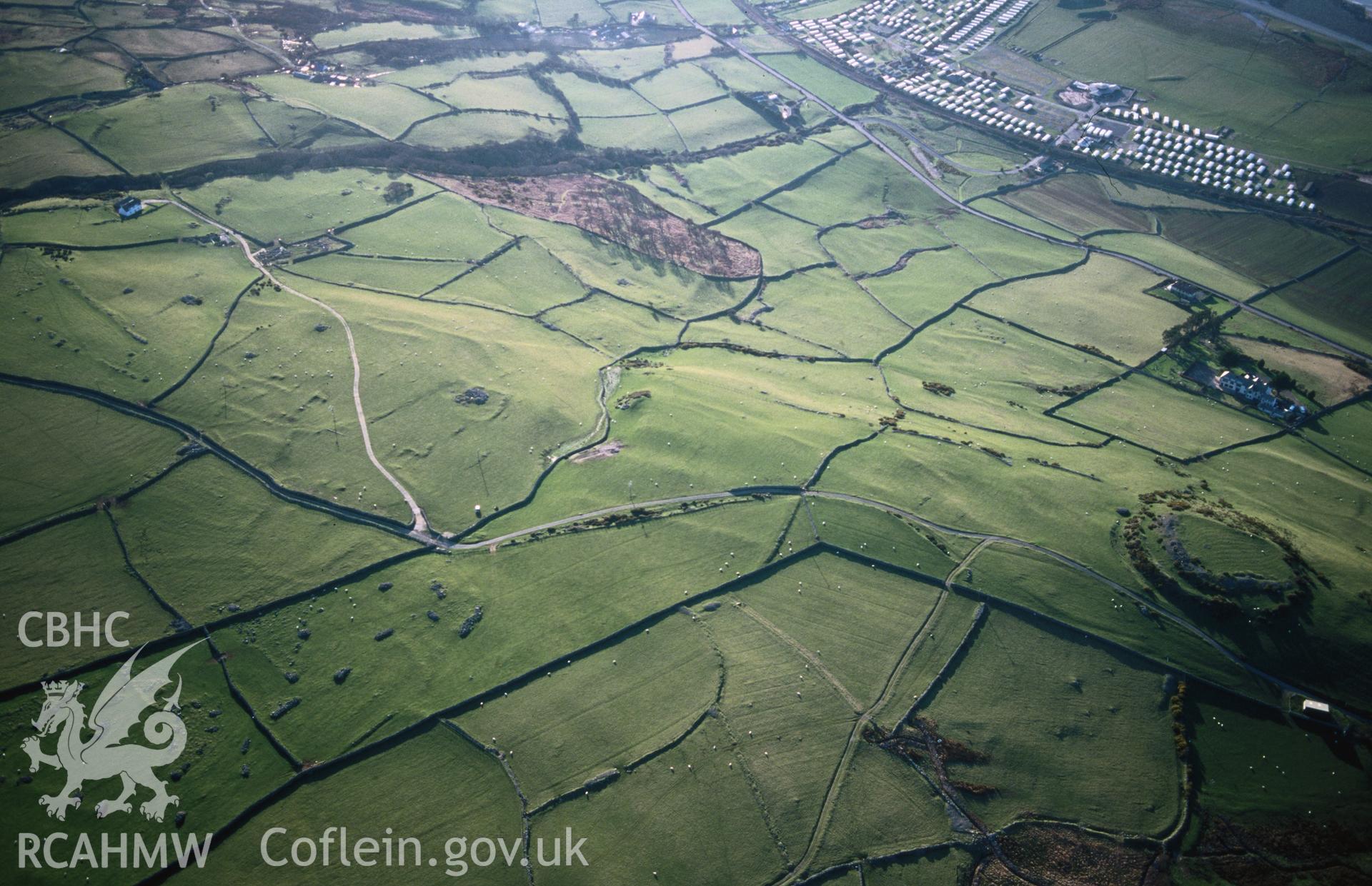 Slide of RCAHMW colour oblique aerial photograph of Castell Y Gaer, taken by T.G. Driver, 17/3/1999.