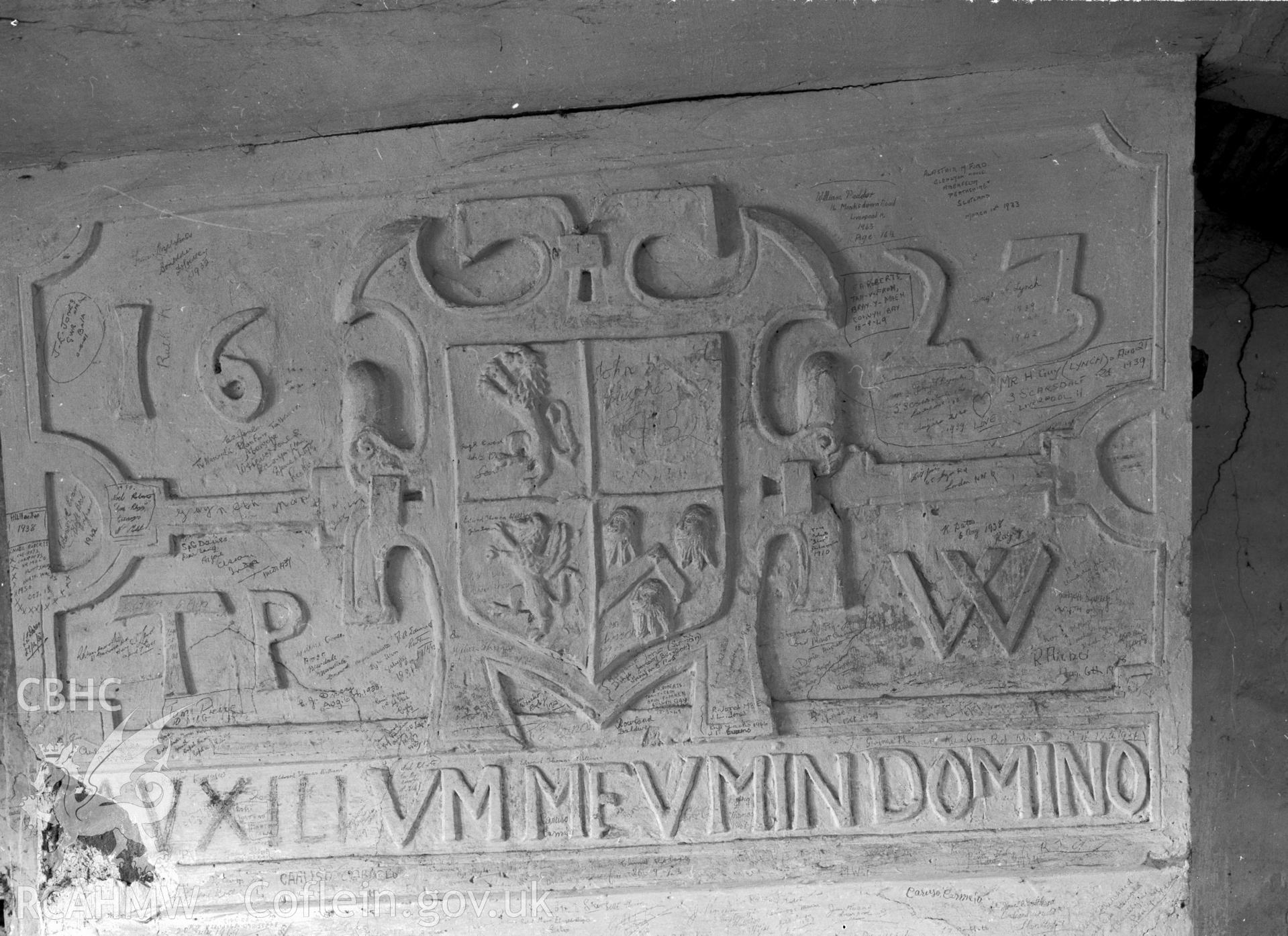 Plaster panel over a fireplace. Shows a dated inscription "1623".