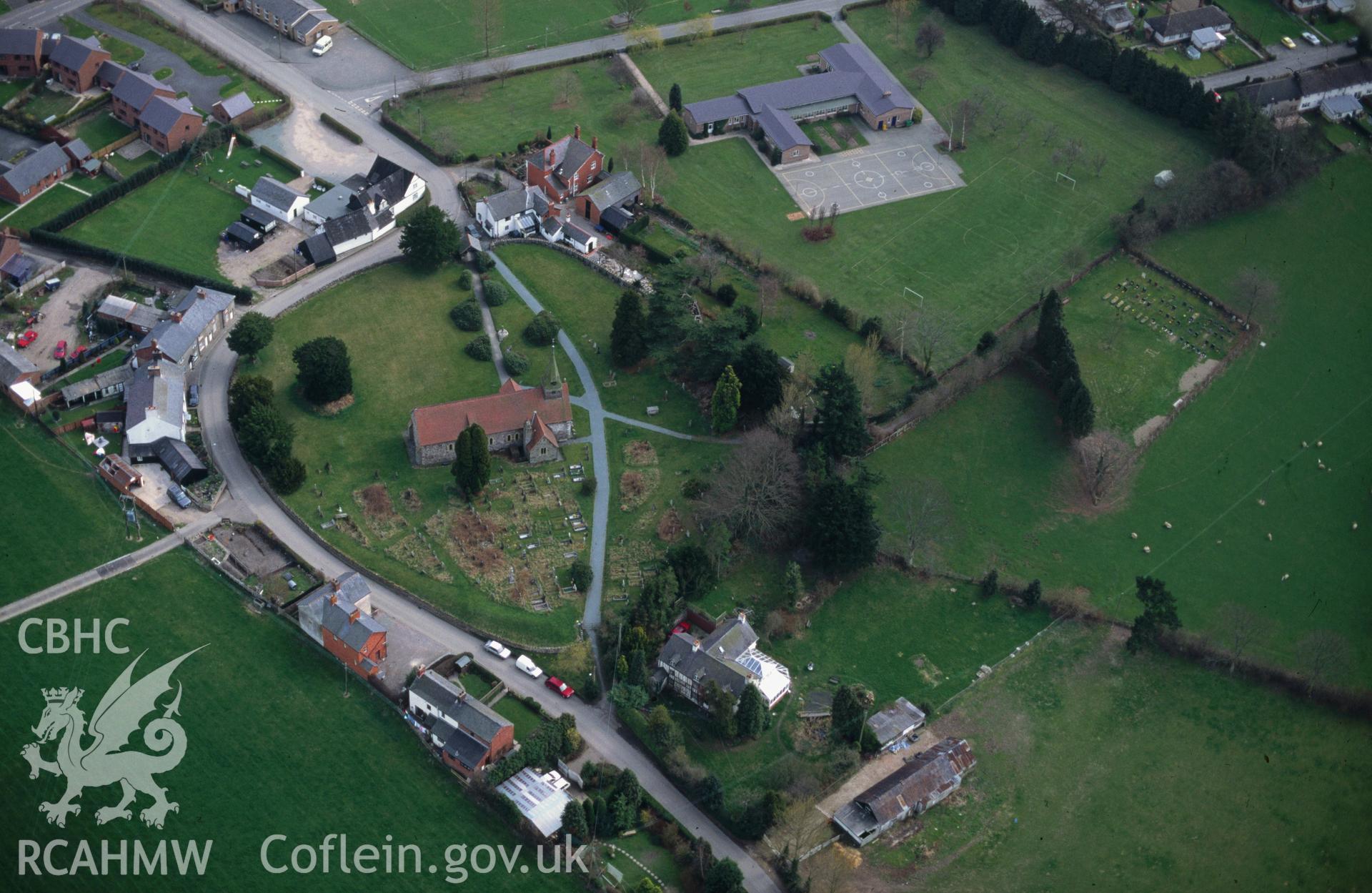 RCAHMW colour slide oblique aerial photograph of Twmpath Garmon, Llanfechain, taken by C.R.Musson on the 11/04/1996