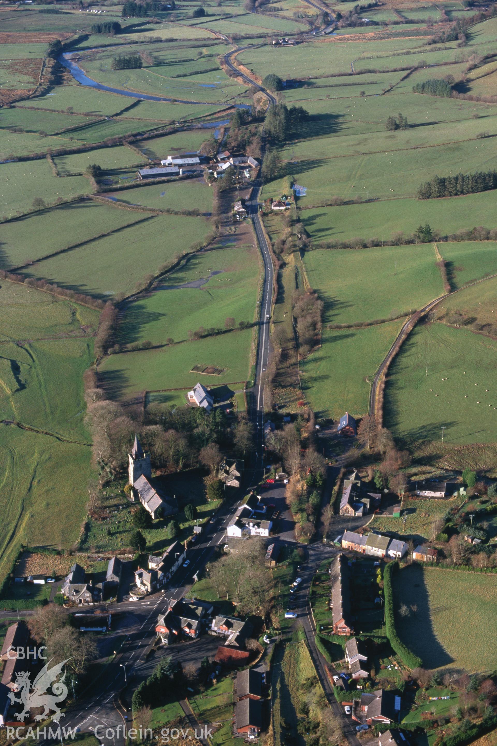 Slide of RCAHMW colour oblique aerial photograph of Llangurig, taken by C.R. Musson, 20/12/1998.