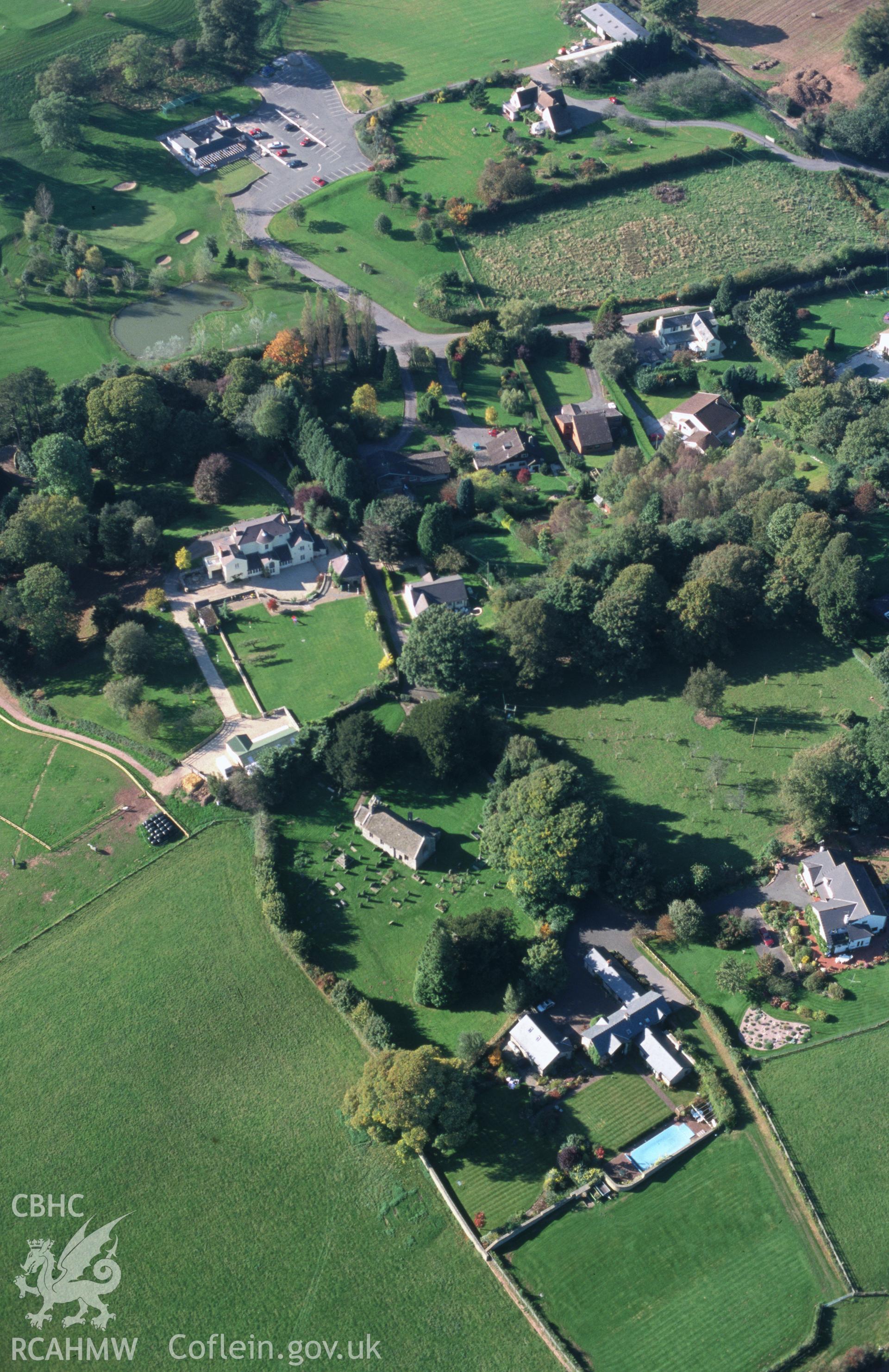 Slide of RCAHMW colour oblique aerial photograph of Bettws Newydd, taken by T.G. Driver, 18/10/1999.