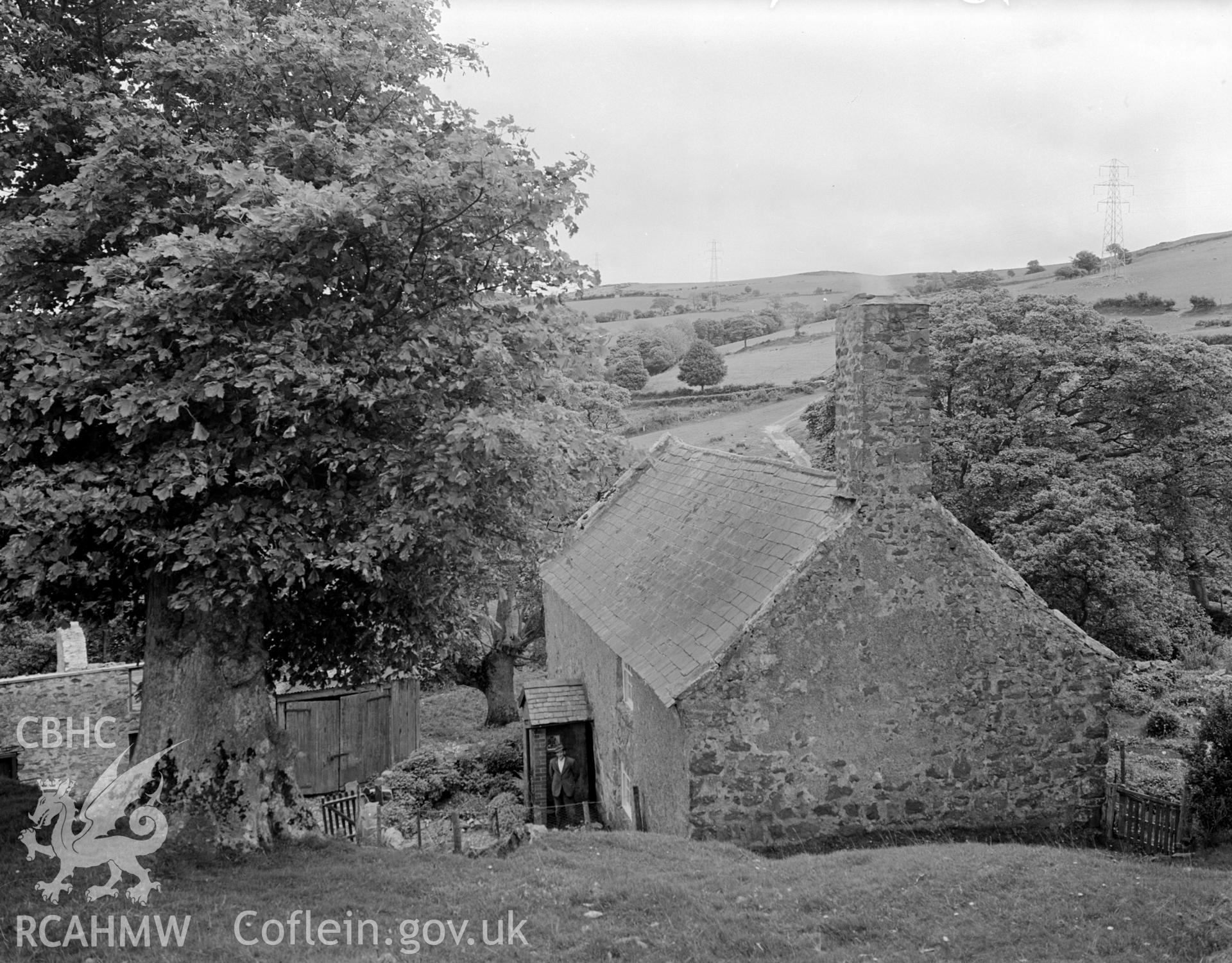 A view of Deheufryn 17th century stone house from the north west showing a gabled chimney.