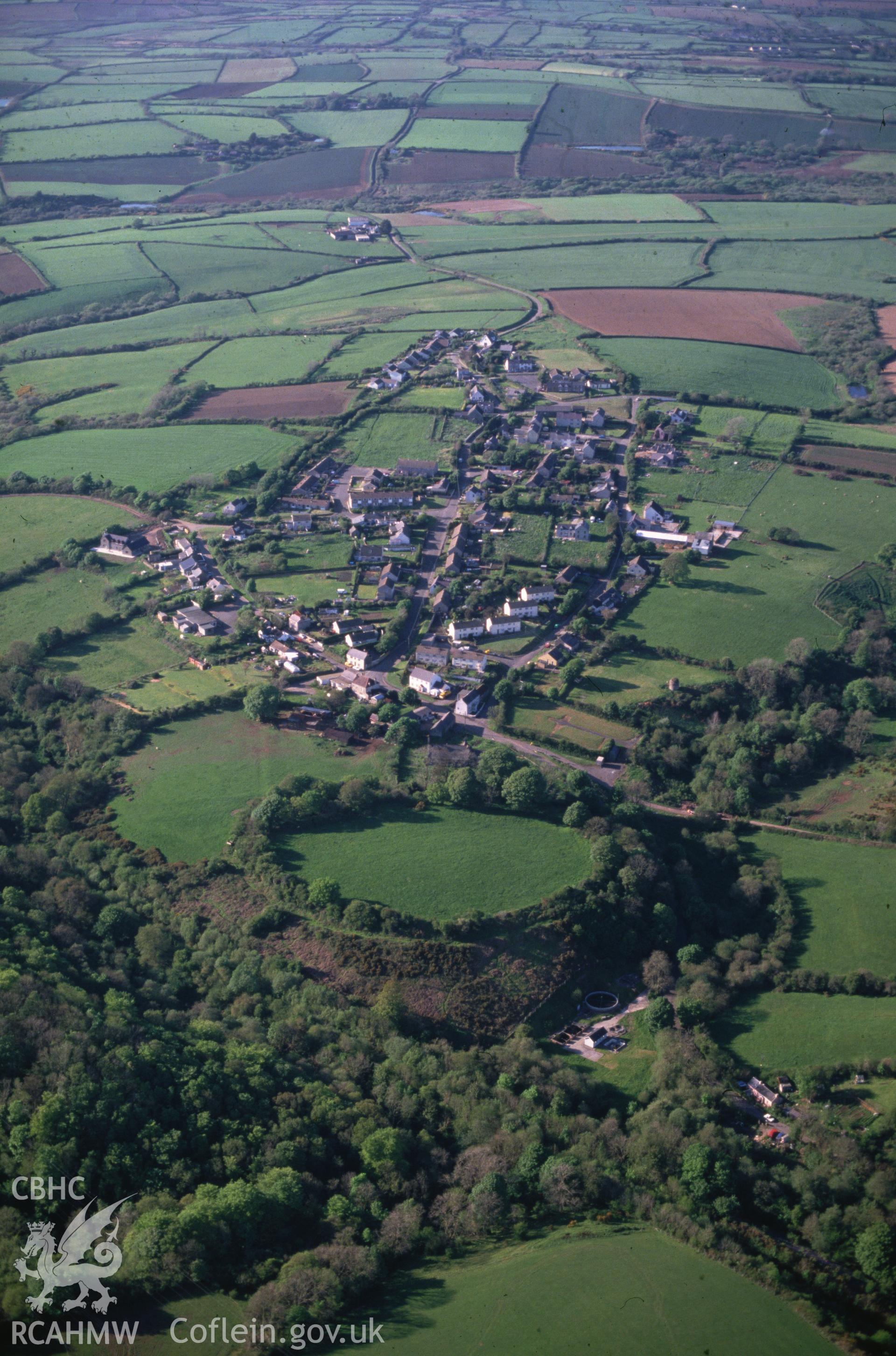 Slide of RCAHMW colour oblique aerial photograph of Rosemarket Rath, taken by C.R. Musson, 18/5/1989.
