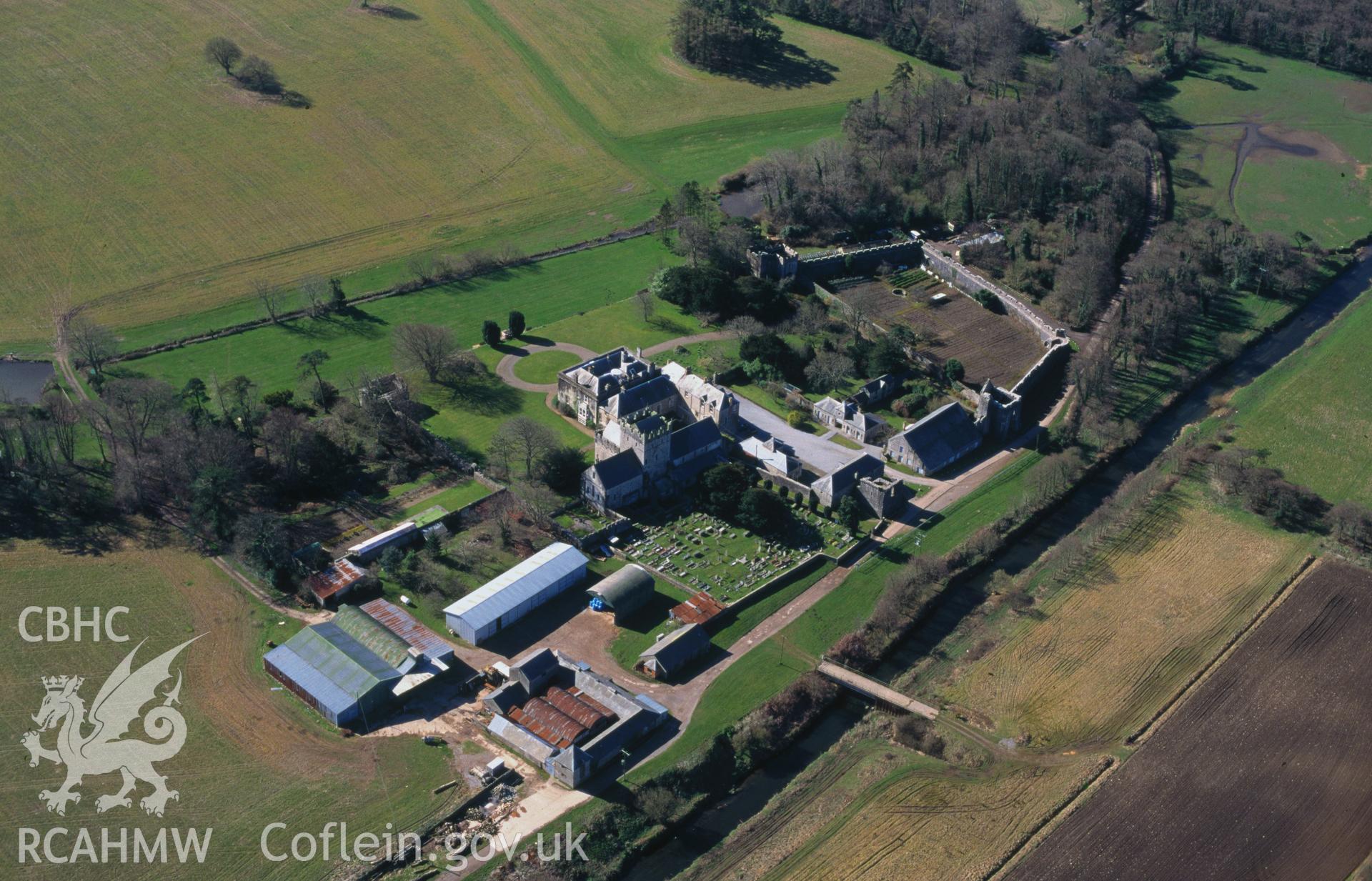 RCAHMW colour oblique aerial photograph of Ewenny Priory taken on 29/03/1995 by C.R. Musson
