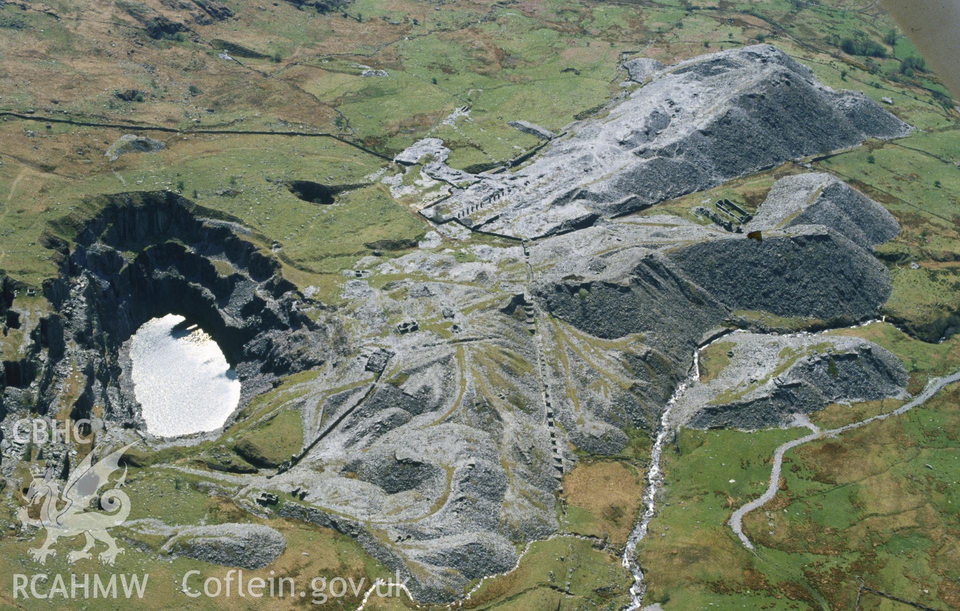 Slide of RCAHMW colour oblique aerial photograph of Glanafon Quarry, Capel Garmon, taken by C.R. Musson, 2/5/1994.
