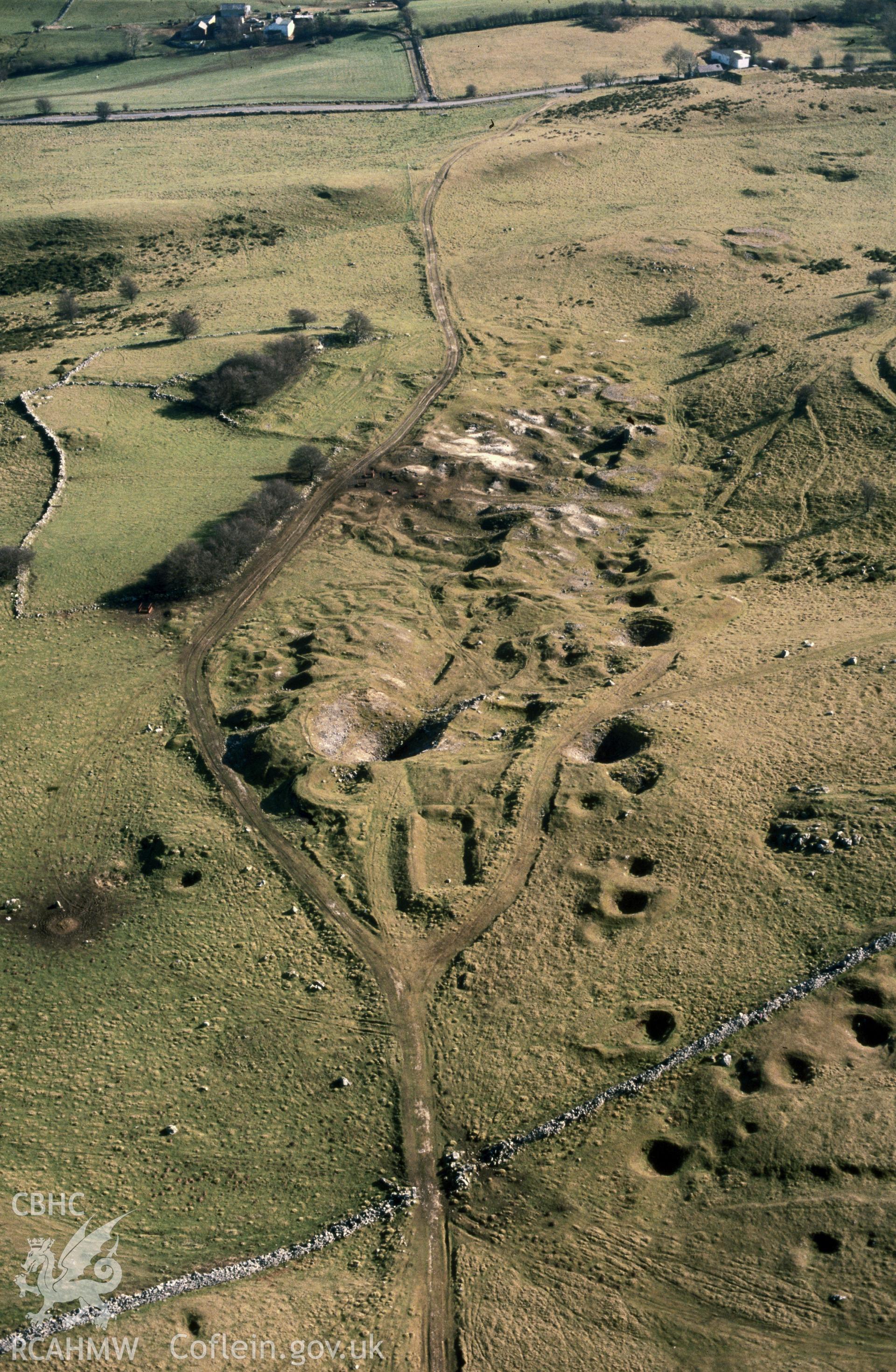 Slide of RCAHMW colour oblique aerial photograph of Belgrave Mine, taken by C.R. Musson, 26/2/1991.