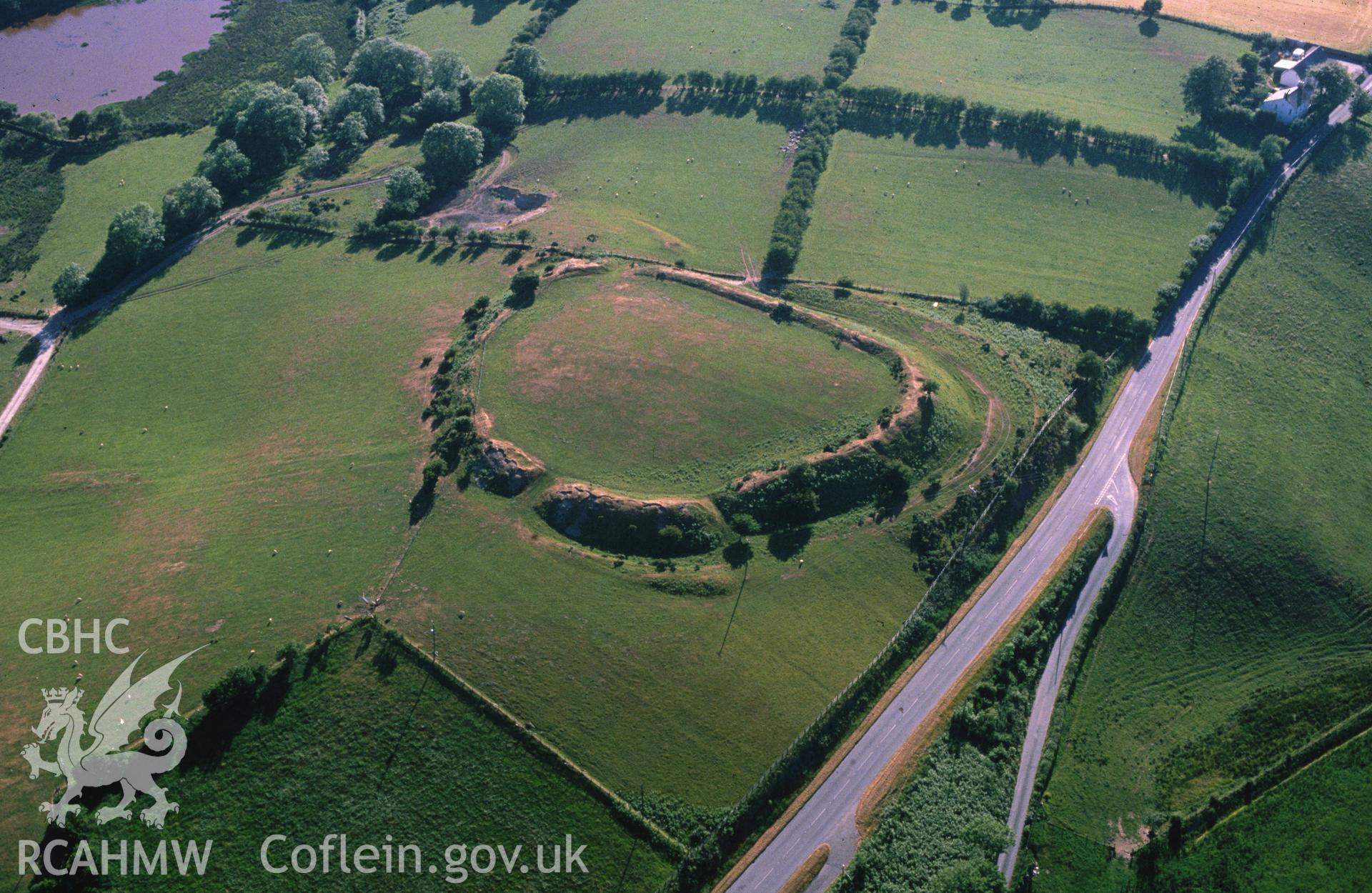 Slide of RCAHMW colour oblique aerial photograph of Castell Flemish, Hillfort, taken by C.R. Musson, 24/6/1989.