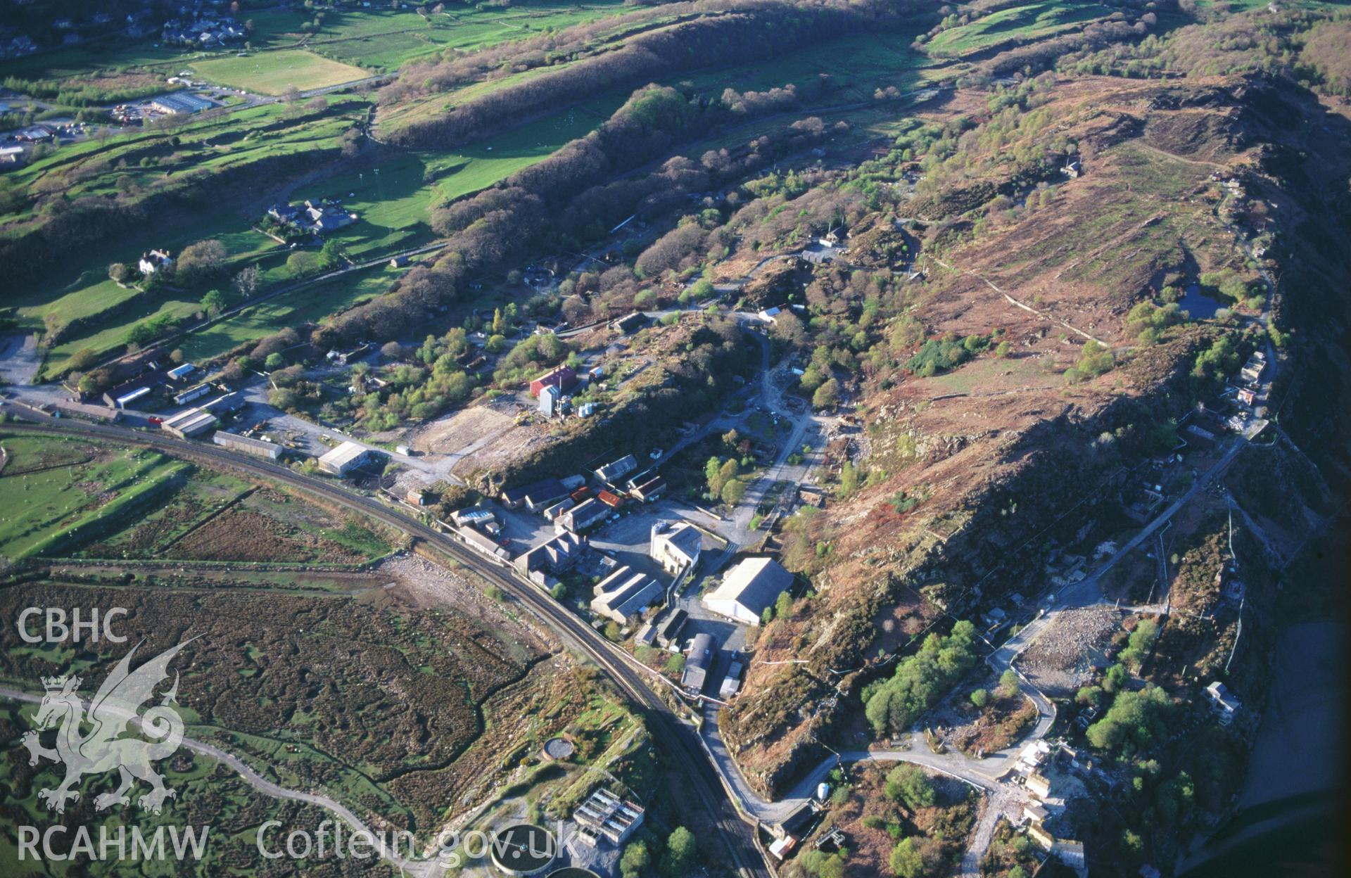 RCAHMW colour slide oblique aerial photograph of Cooke's Explosive Works, Penrhyndeudraeth, taken by C.R.Musson on the 30/03/1996