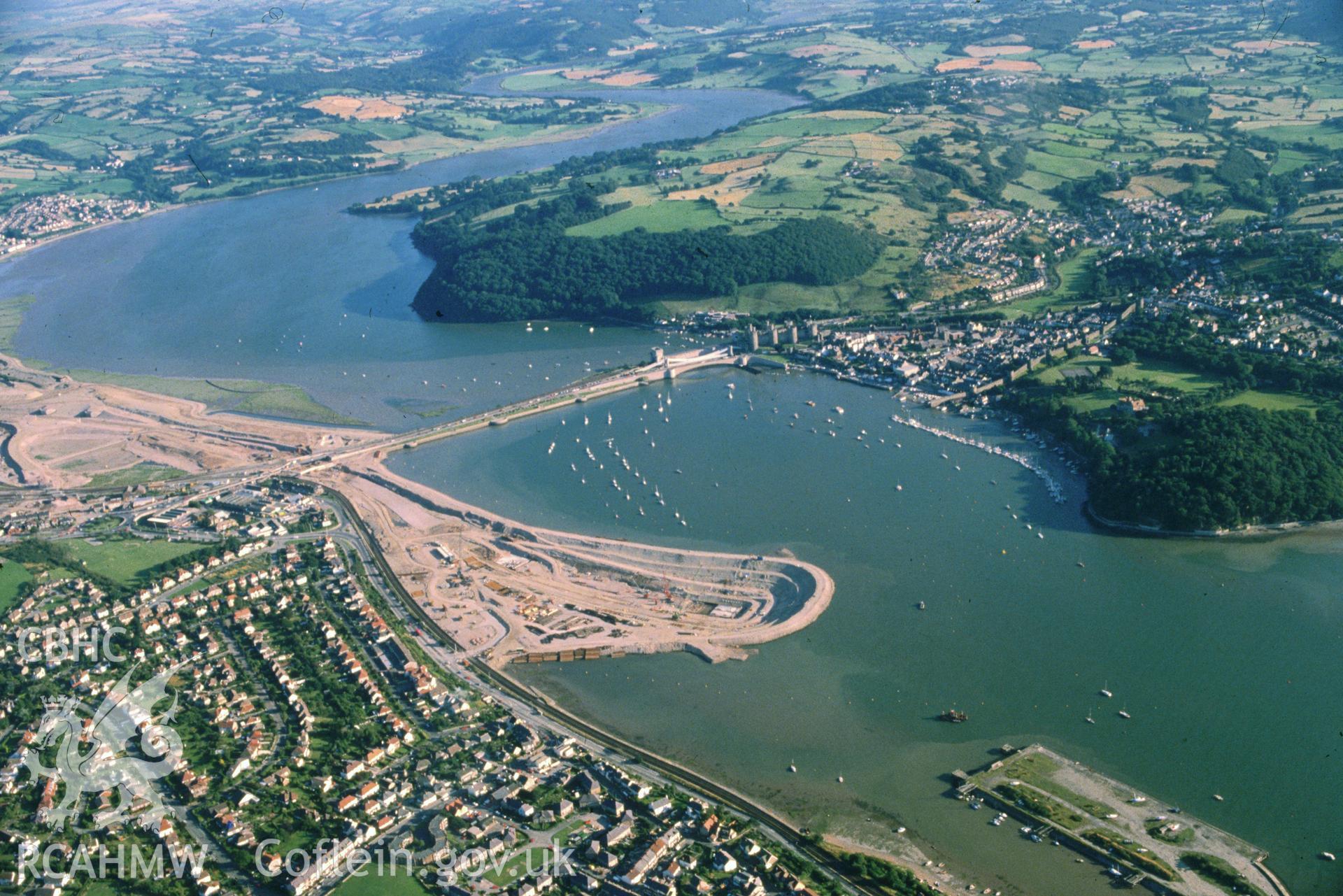 Slide of RCAHMW colour oblique aerial photograph of Conway Suspension Bridge, taken by C.R. Musson, 5/8/1988.