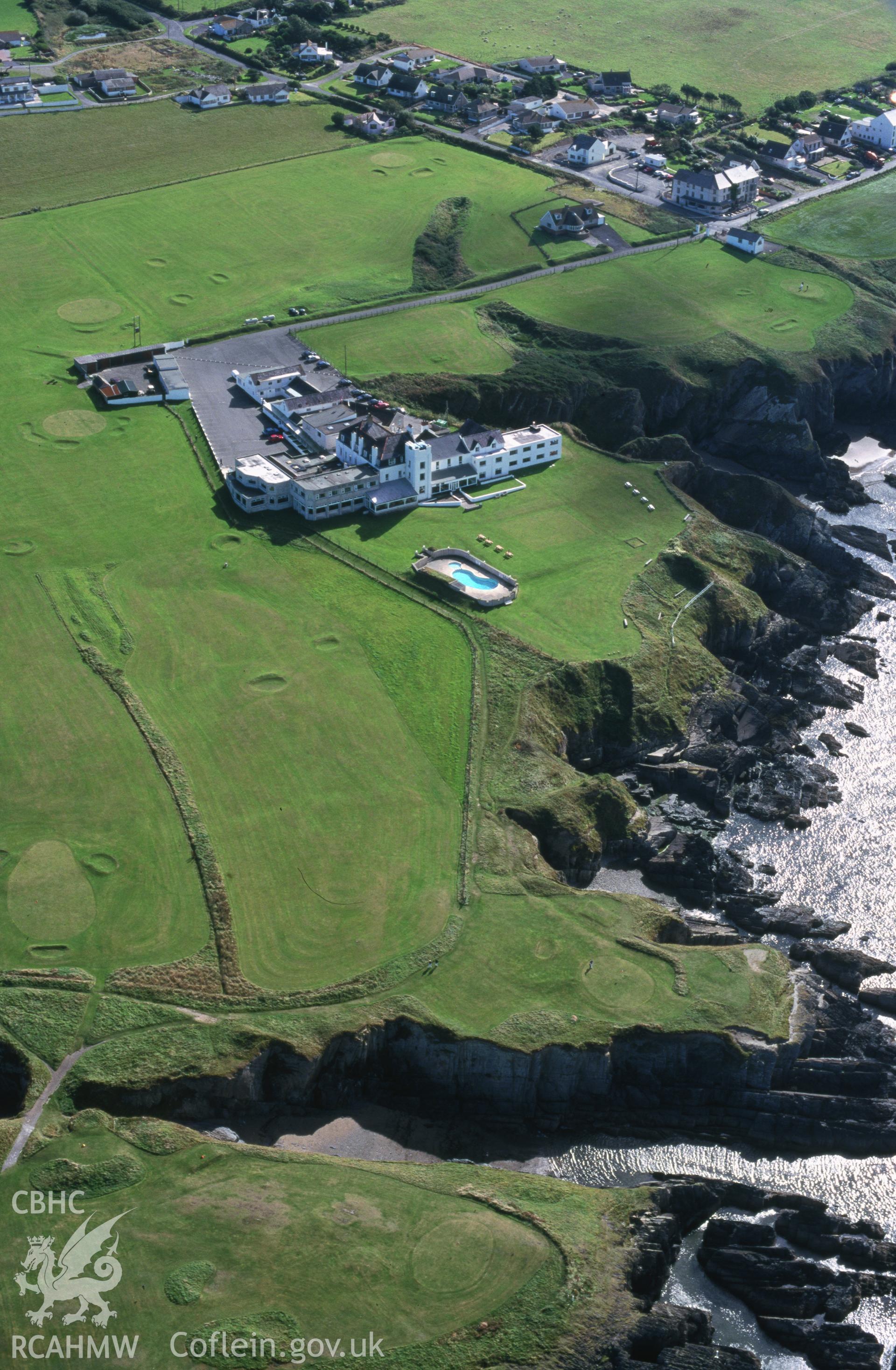 Slide of RCAHMW colour oblique aerial photograph of Hotel Gwbert, taken by T.G. Driver, 25/9/2000.