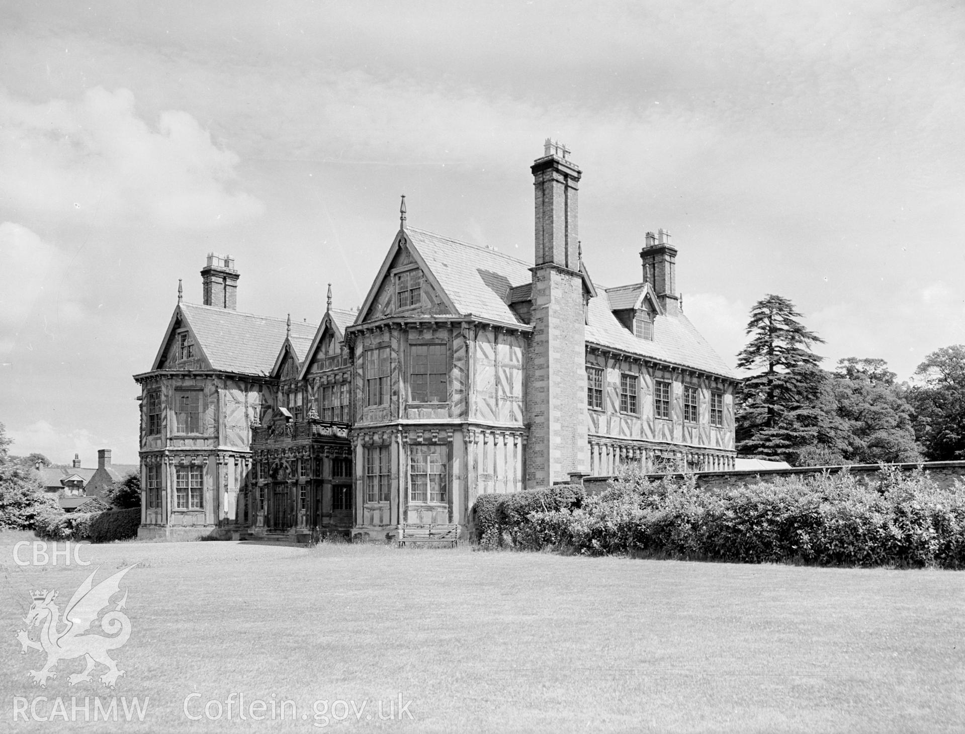 A view from the south west, showing two dormer windows and a chimney stack down the side of the hall