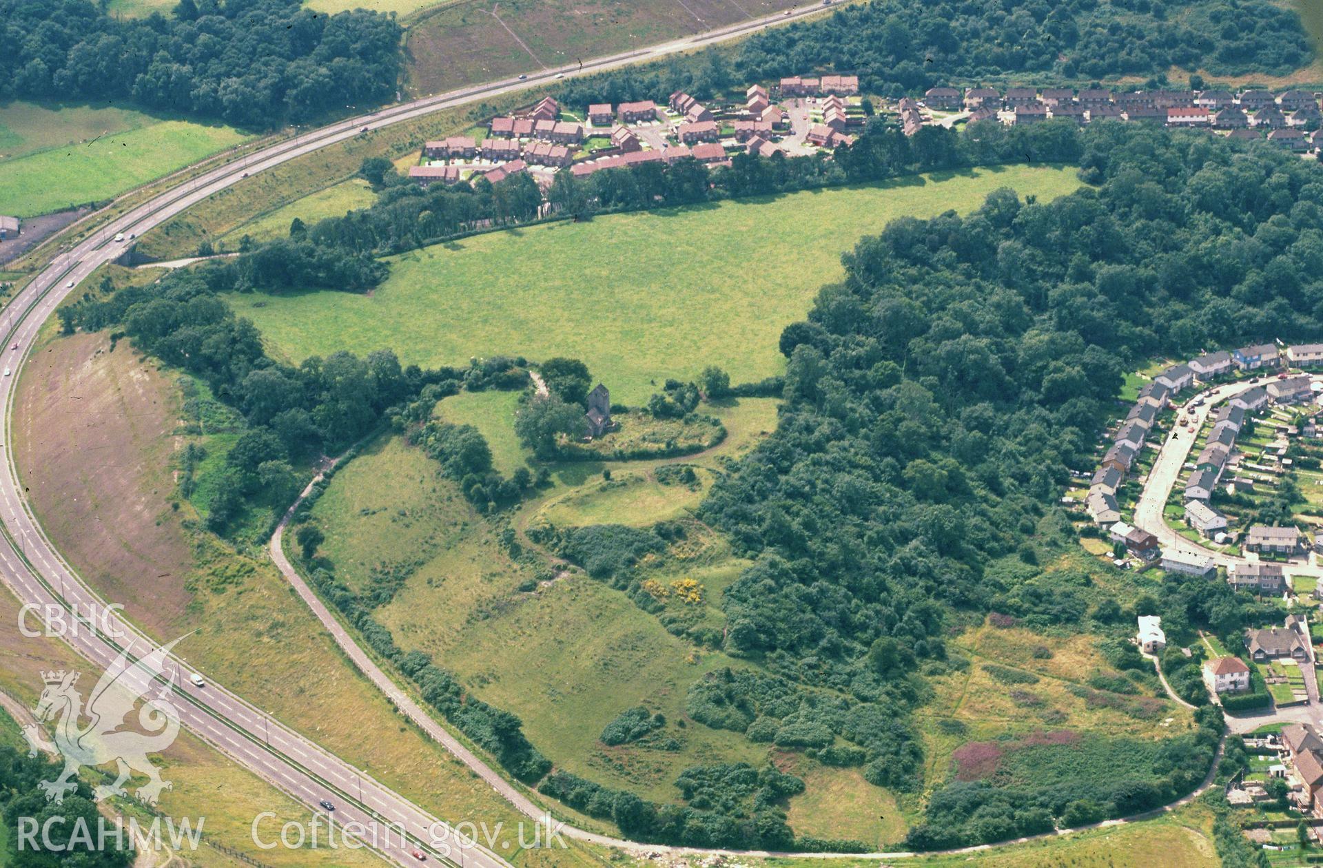 Slide of RCAHMW colour oblique aerial photograph of Caerau Hillfort, taken by C.R. Musson, 3/8/1988.