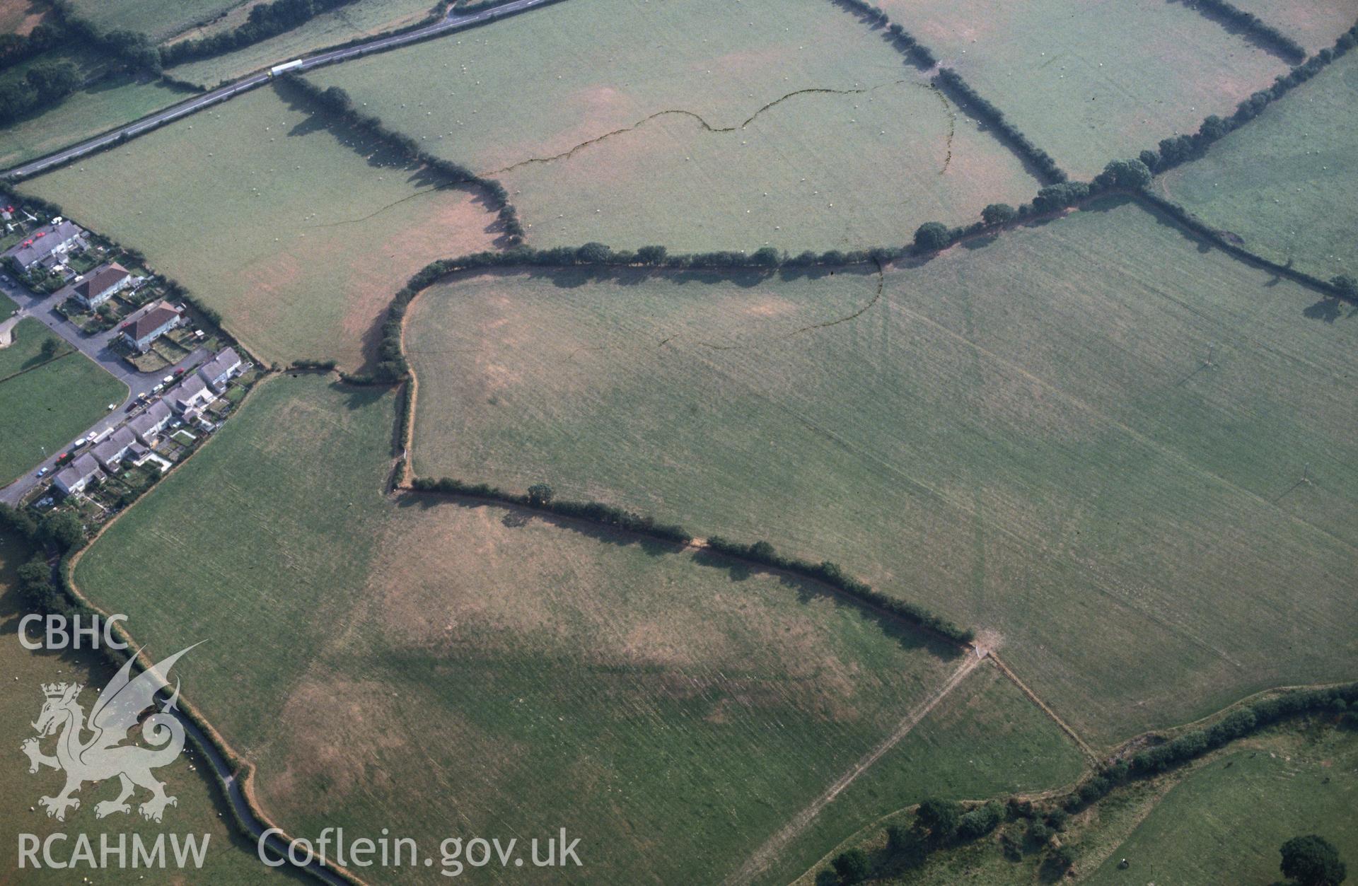 Slide of RCAHMW colour oblique aerial photograph of Pen-llwyn Roman Fort, taken by C.R. Musson, 3/8/1990.