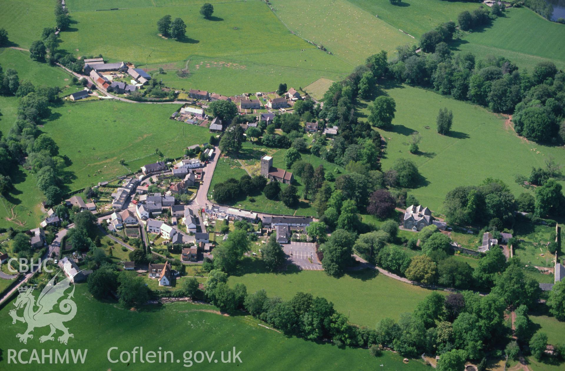 Slide of RCAHMW colour oblique aerial photograph of Llanfrynach, taken by C.R. Musson, 24/5/1990.