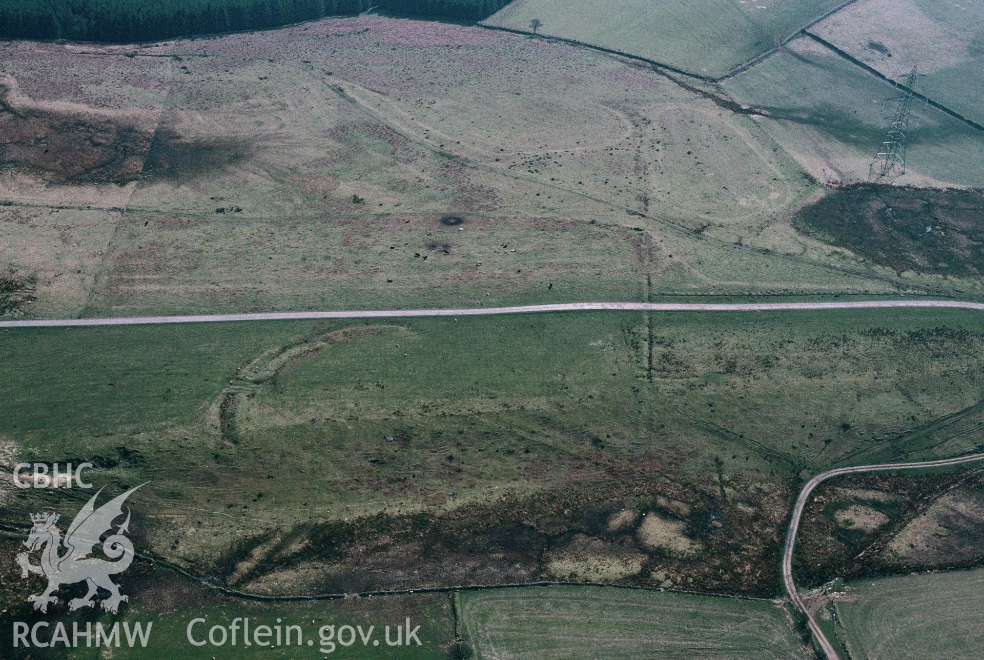 RCAHMW colour slide oblique aerial photograph of Blaen Cwm Bach Camp, Tonna, taken by C.R. Musson, 18/04/94