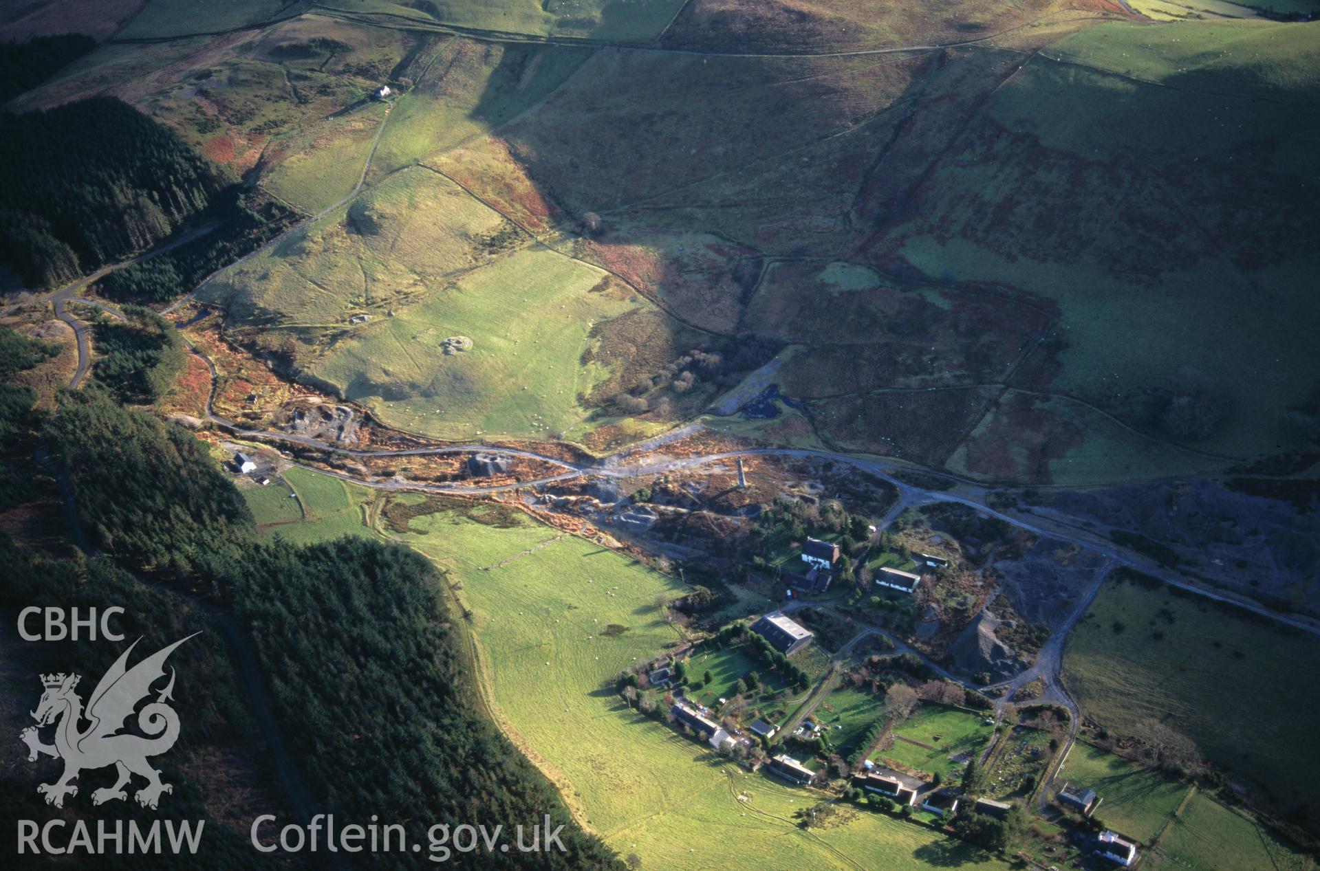 Slide of RCAHMW colour oblique aerial photograph of Cwmsymlog Lead Mine (general);east Darren Lead Mine, taken by T.G. Driver, 4/12/1998.