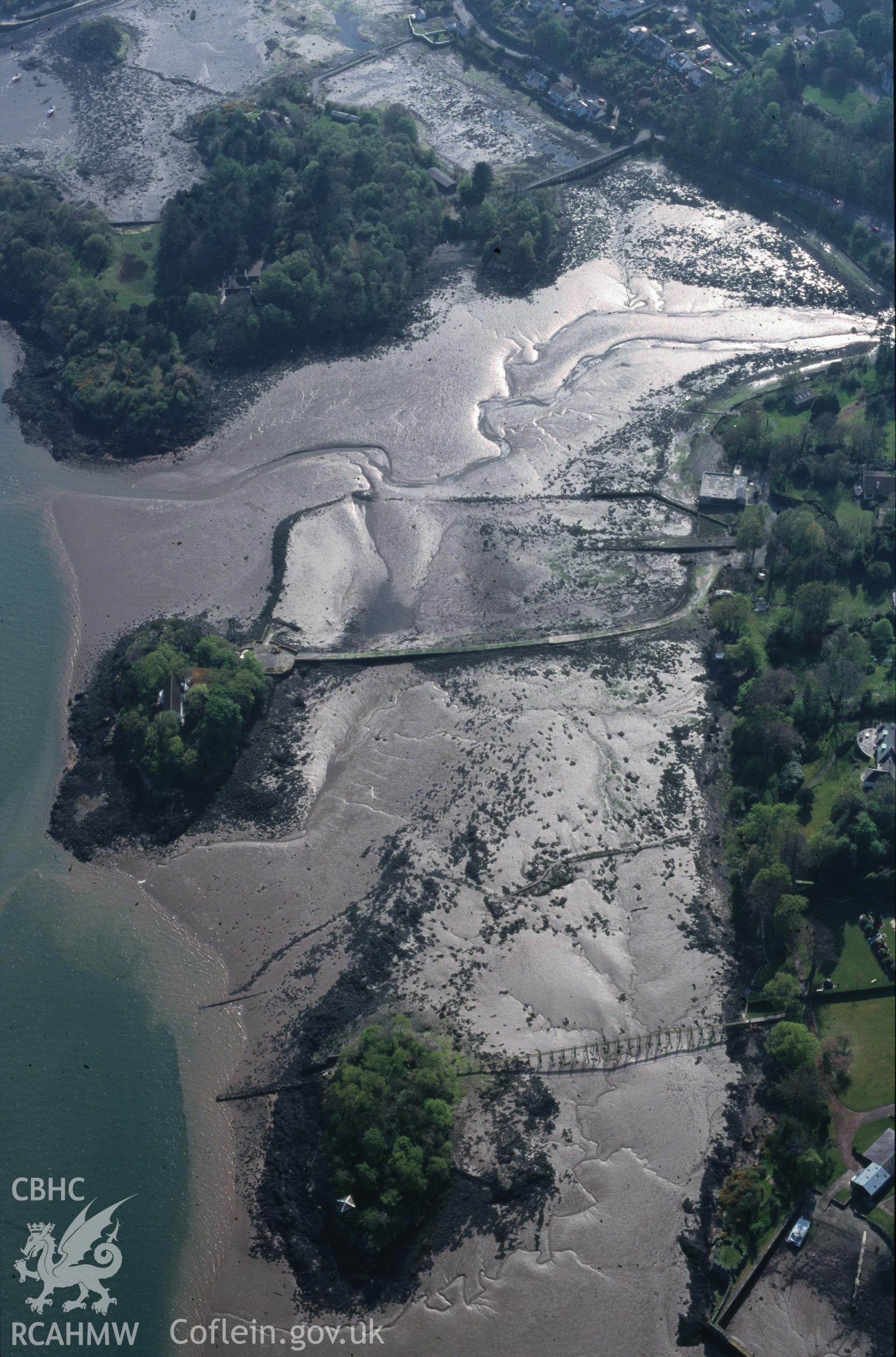 Slide of RCAHMW colour oblique aerial photograph of Ynys Castell, Cwm Cadnant, taken by T.G. Driver, 28/4/1999.