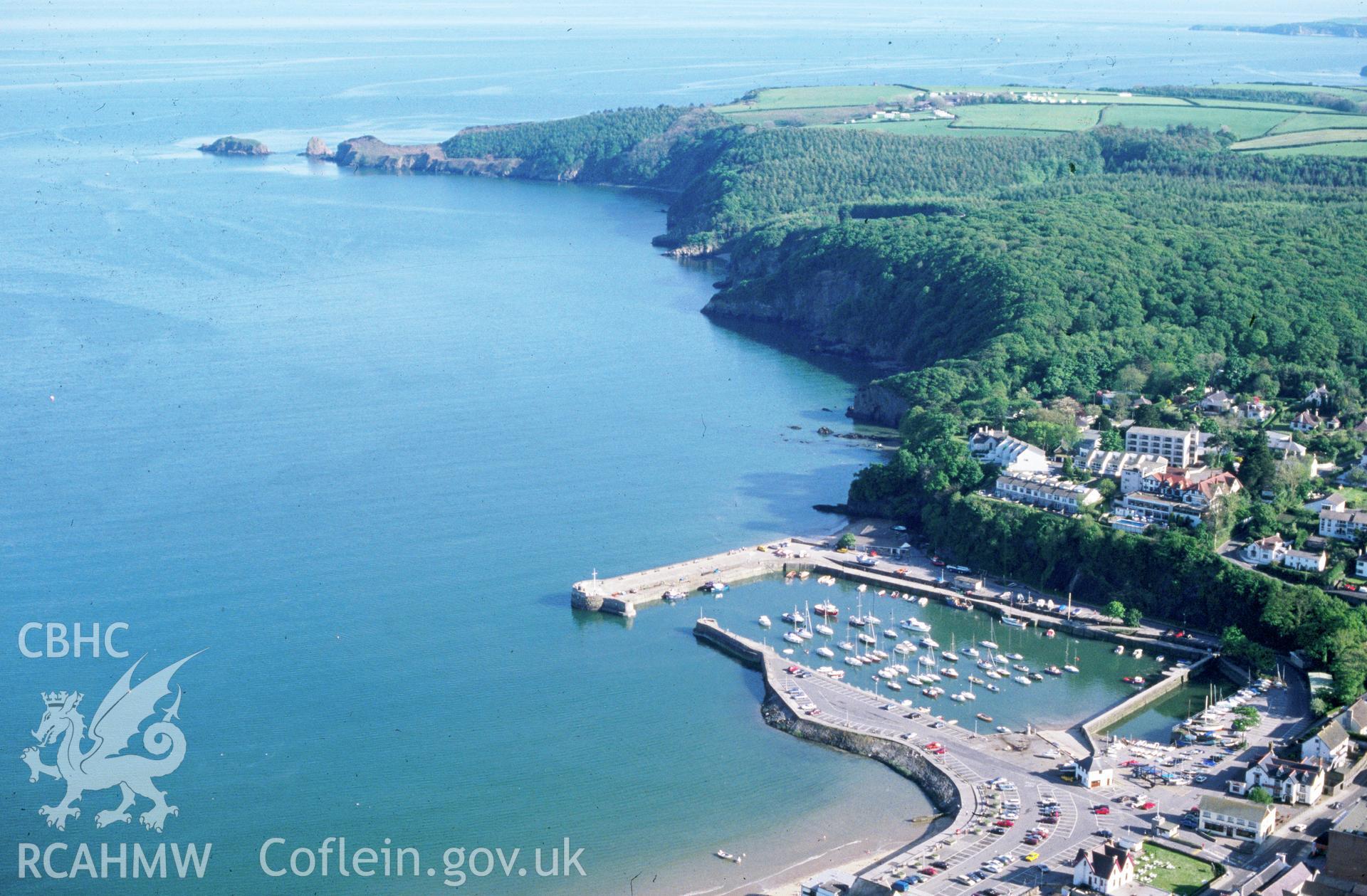 Slide of RCAHMW colour oblique aerial photograph of Saundersfoot Harbour, taken by C.R. Musson, 18/5/1989.
