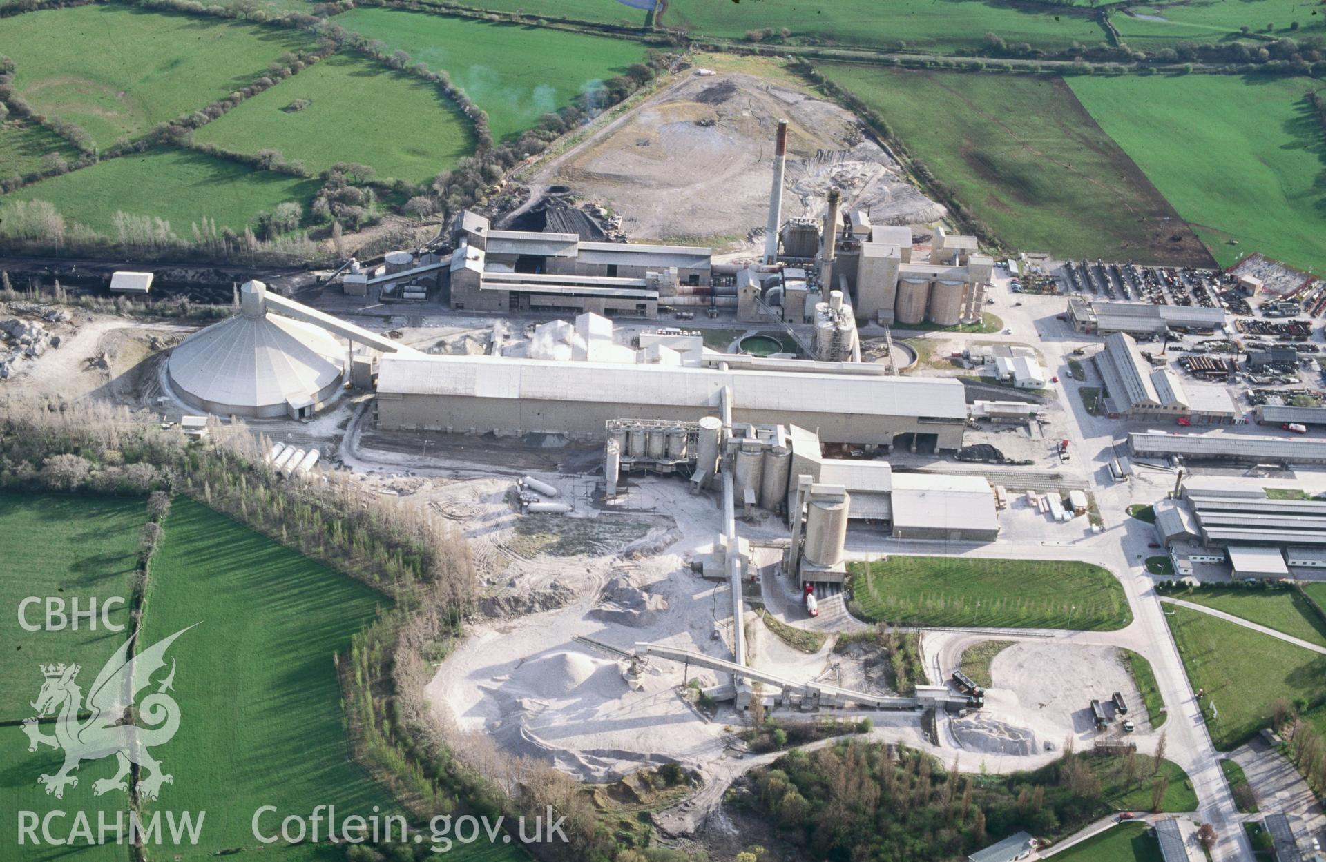 RCAHMW colour oblique aerial photograph of cement works at penyffordd taken on 07/04/1995 by C.R. Musson