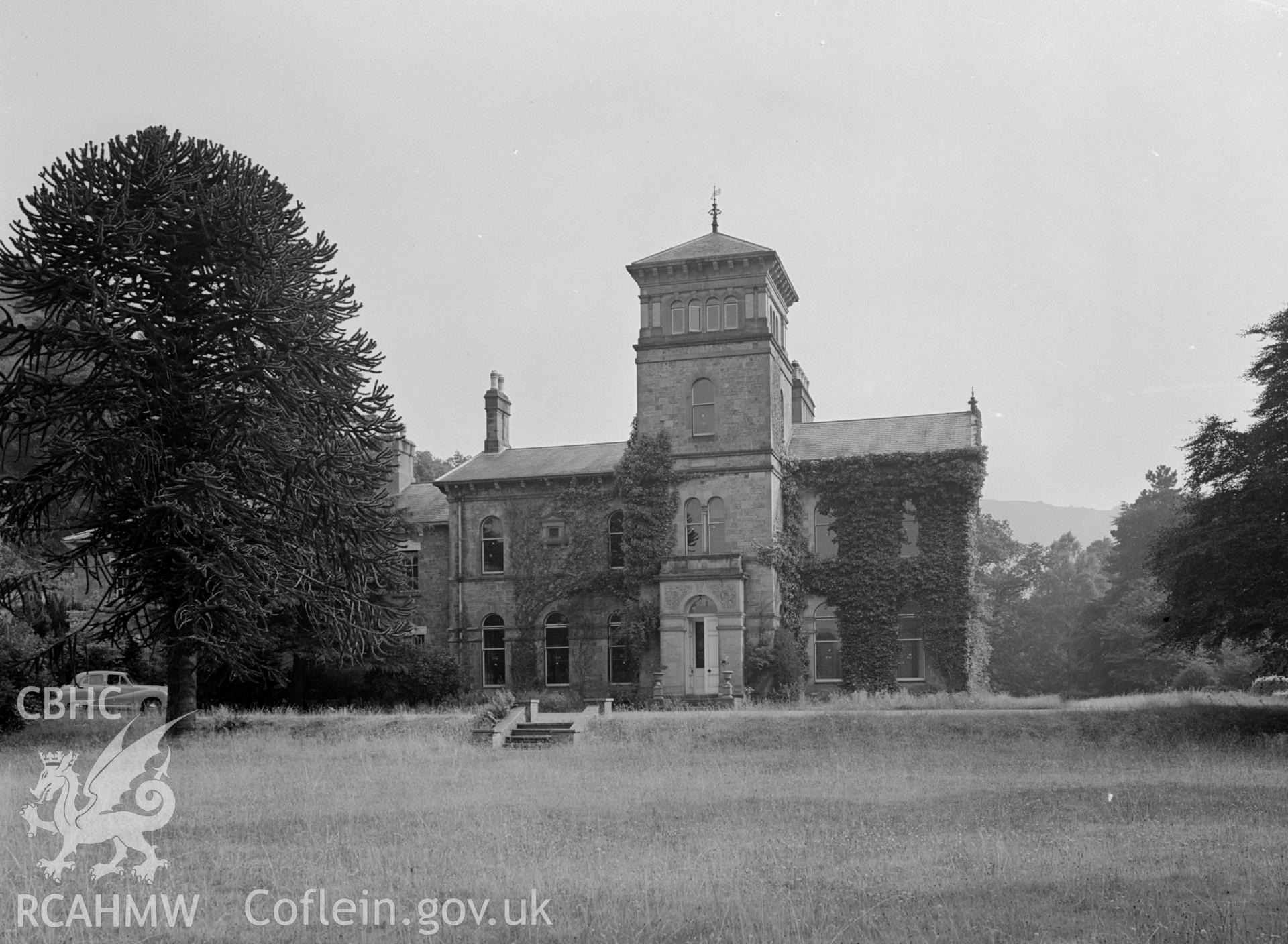 View of Coed-y-Celyn. Two storey building with gable roofing.