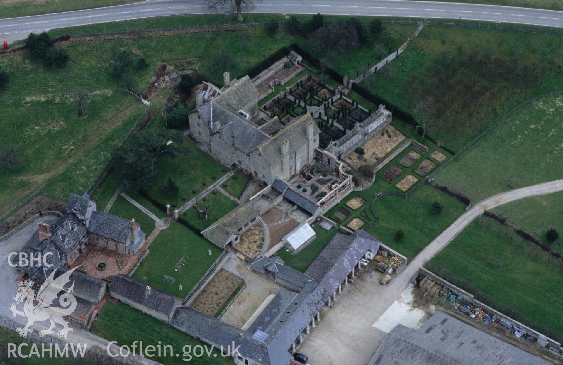 RCAHMW colour oblique aerial photograph of Monaughty Park taken on 21/03/1995 by C.R. Musson