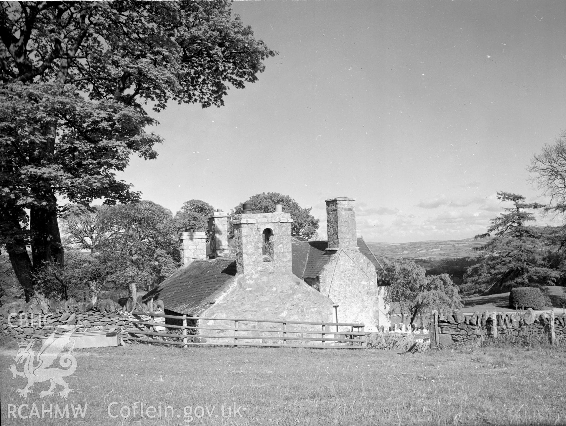 A view of a chimney stack with an arched "hole" in the middle.