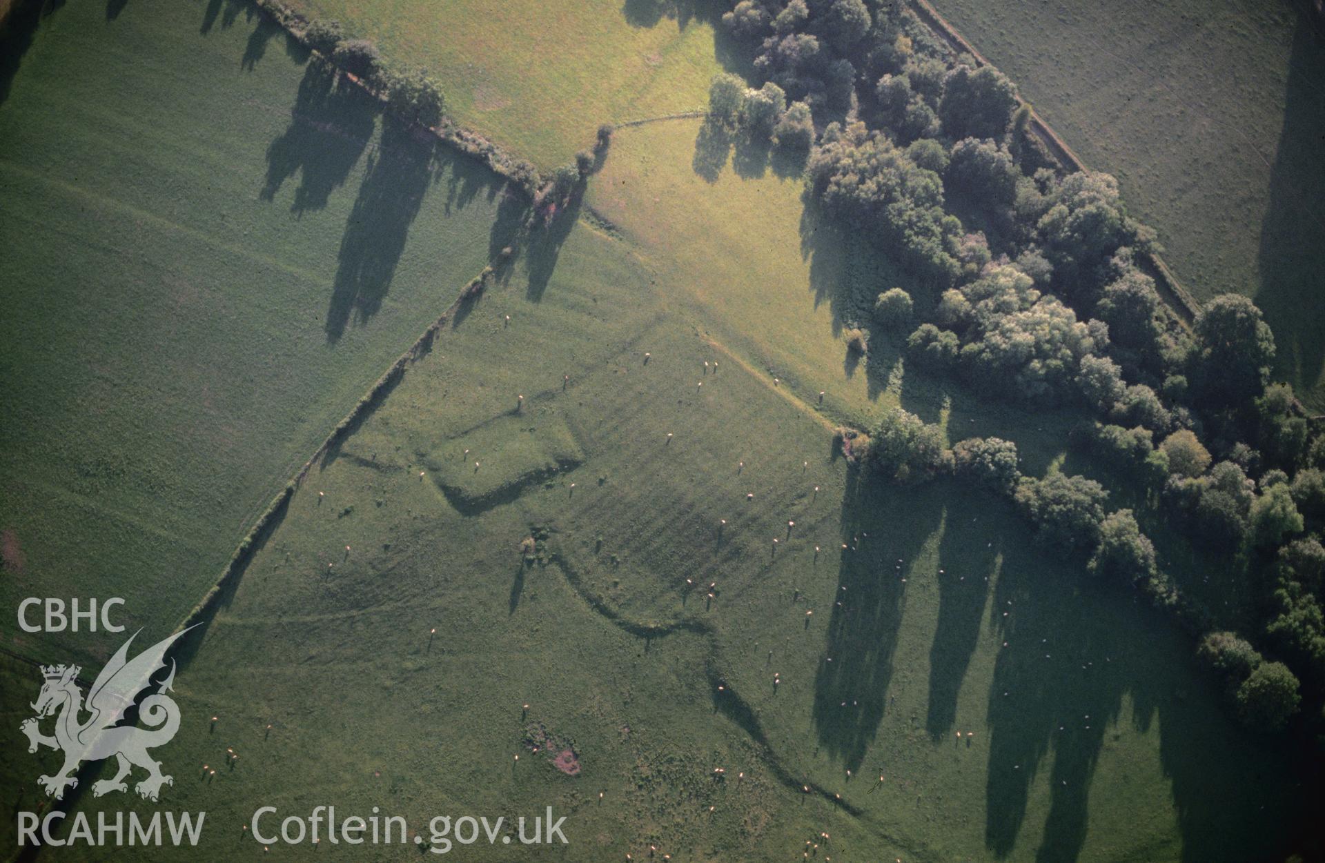 Slide of RCAHMW colour oblique aerial photograph of St Noyes Chapel, taken by C.R. Musson, 11/7/1990.