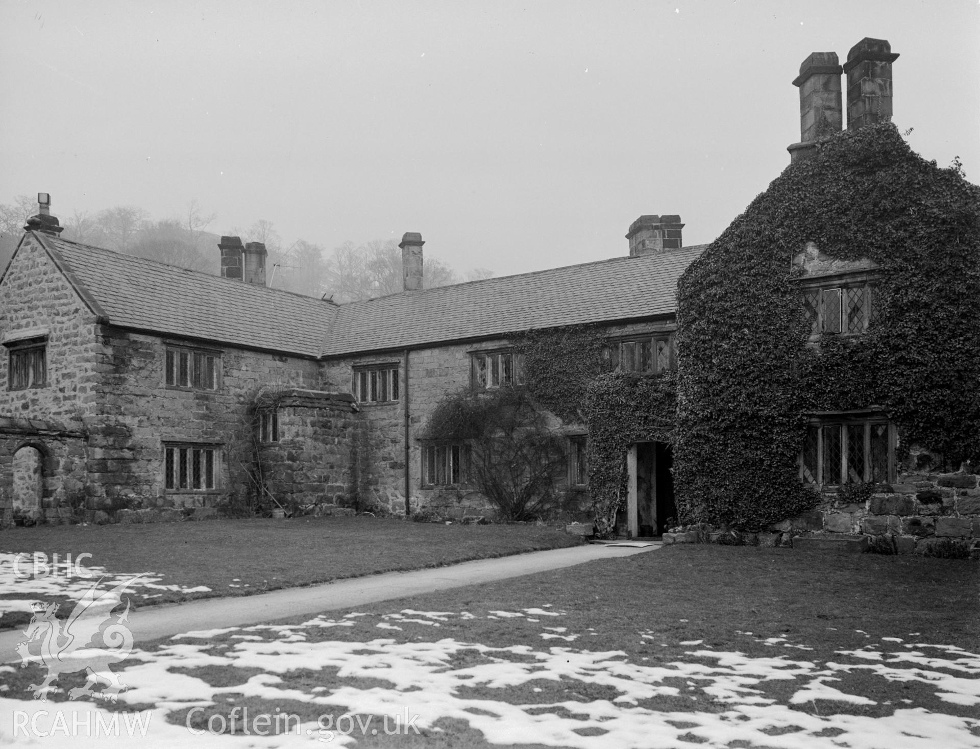 An H-shaped two storey, 17th century stone country house.
