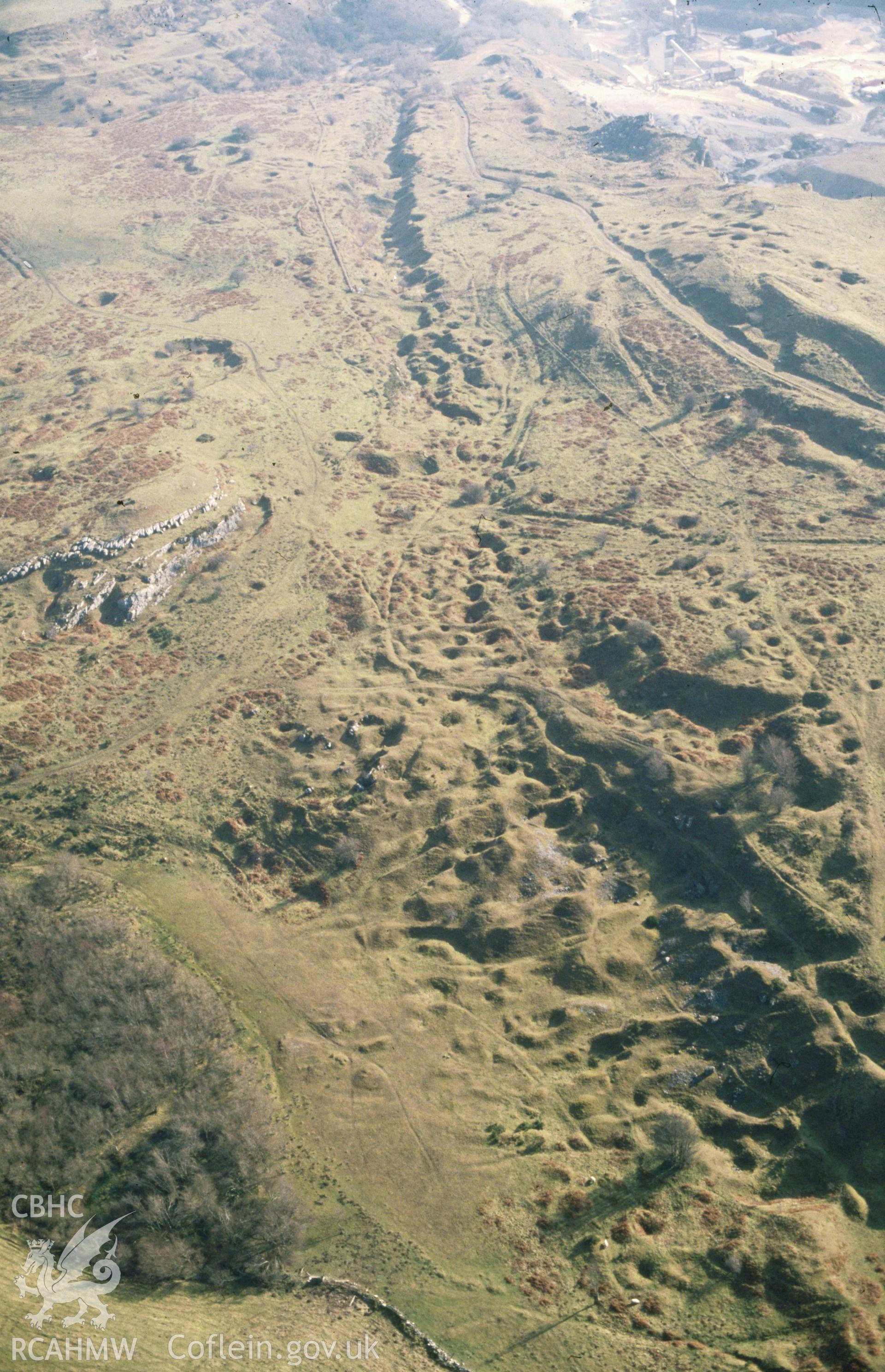 Slide of RCAHMW colour oblique aerial photograph of Esclusham Mountain Lead Mines, taken by C.R. Musson, 26/2/1991.