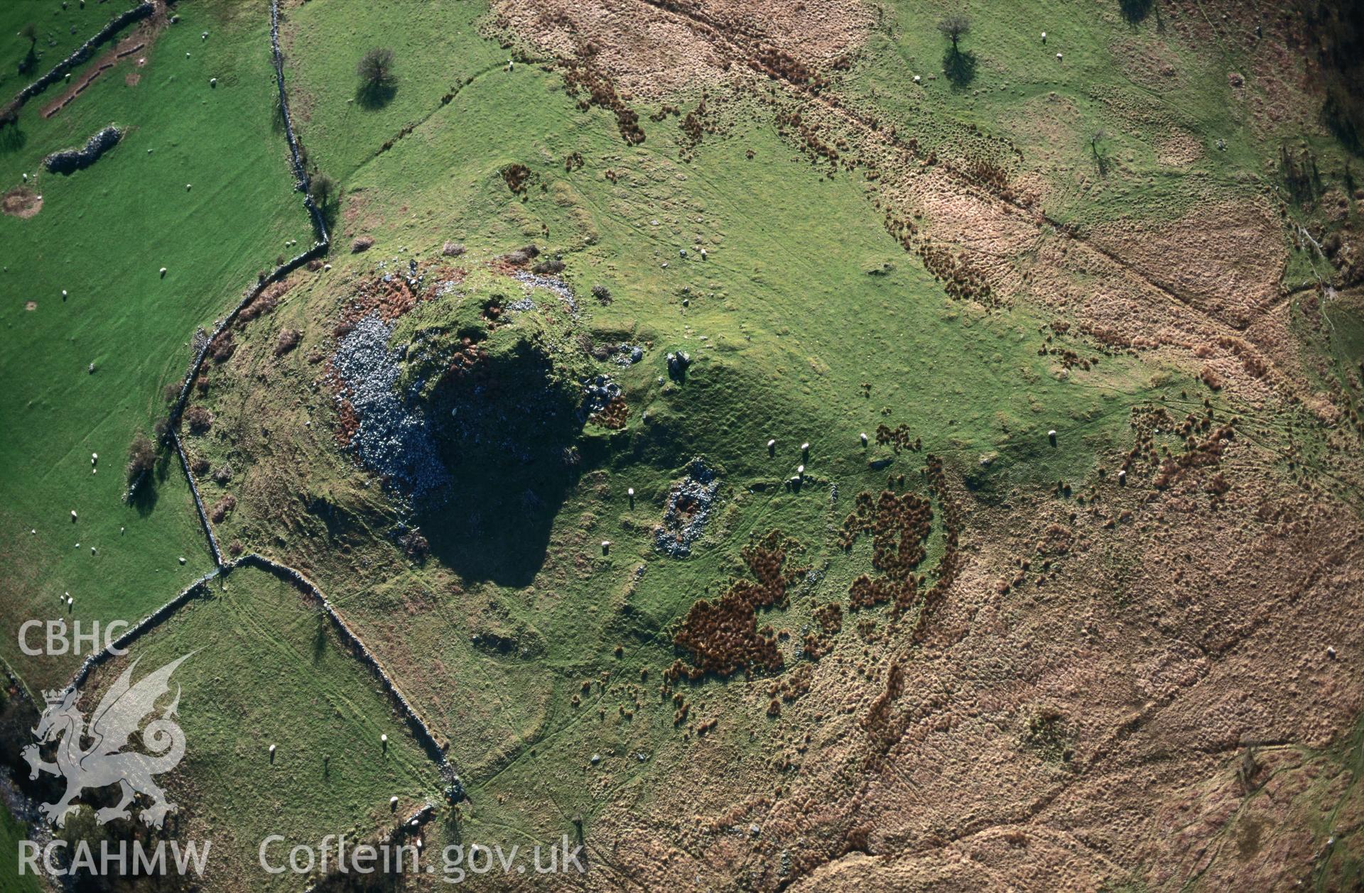 RCAHMW colour slide oblique aerial photograph of Castell Prysor, Trawsfynydd, taken by C.R.Musson on the 30/03/1996