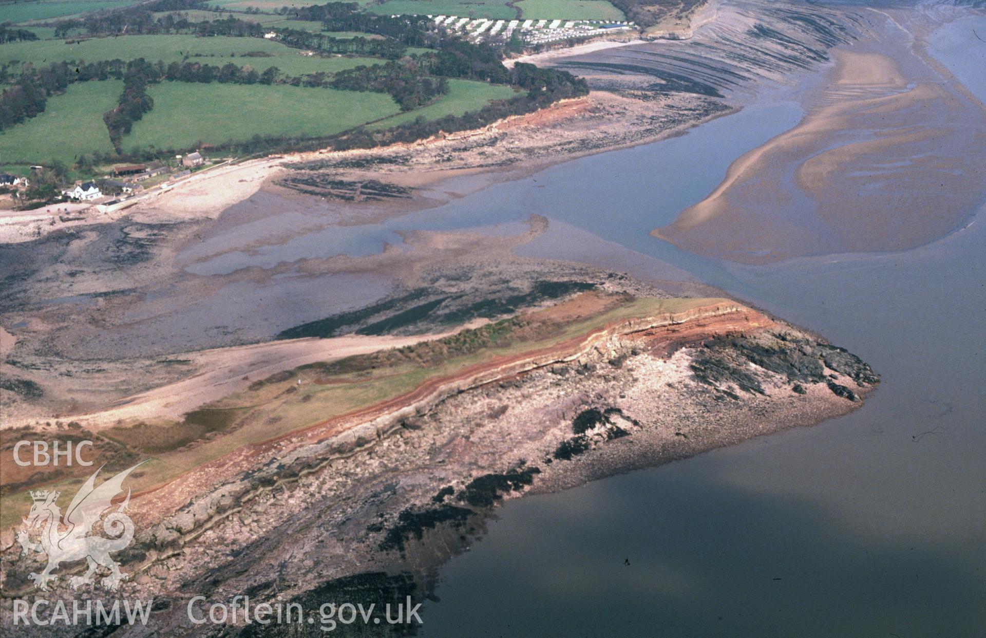 Slide of RCAHMW colour oblique aerial photograph of Sully Island Promontory Fort, taken by C.R. Musson, 26/3/1990.