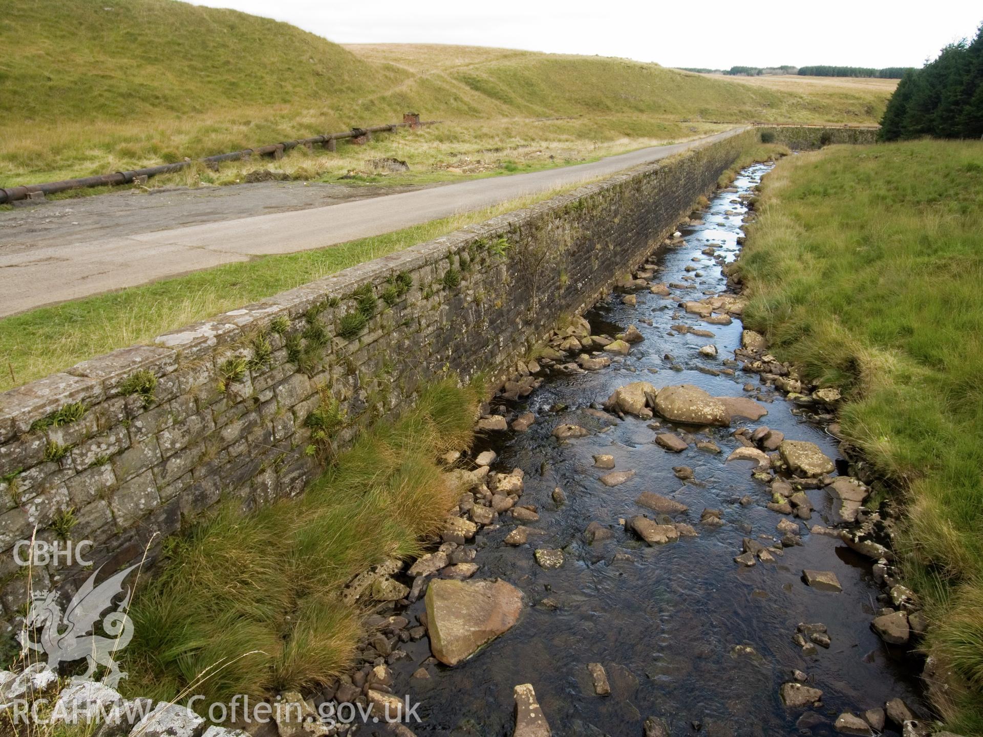 view looking E of C20 revetment by stream.