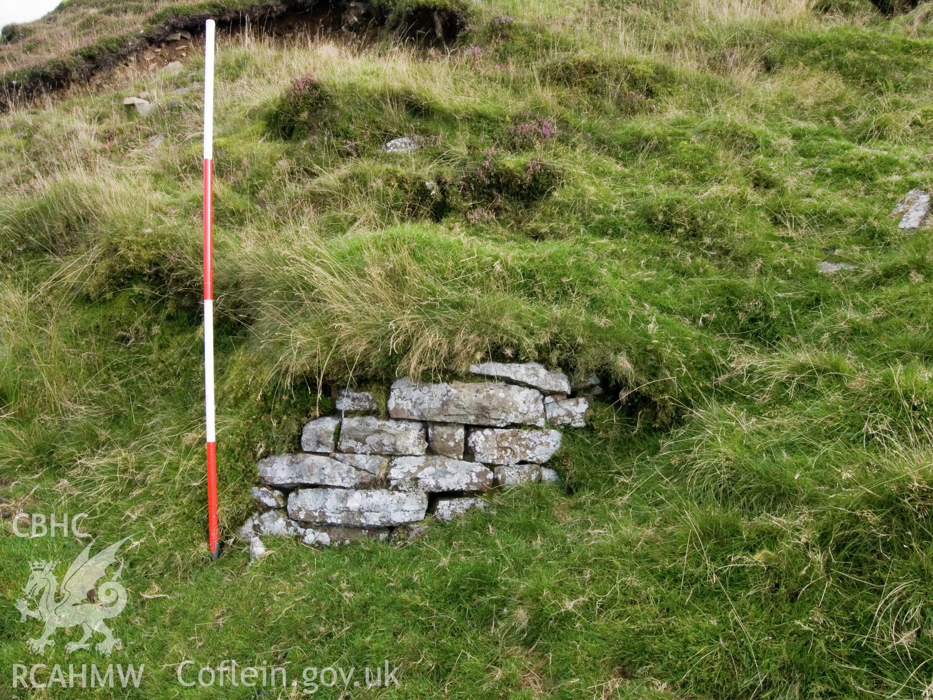 view of masonry revetment at entrance to cutting.
